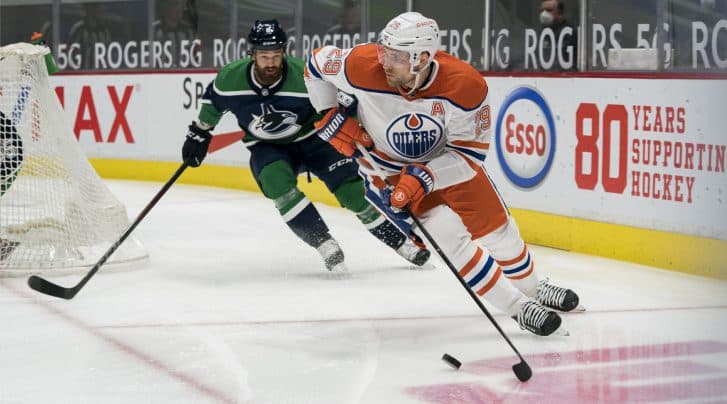 Vancouver Canucks acquire Madison Bowey, trade Jordie Benn to Winnipeg Jets