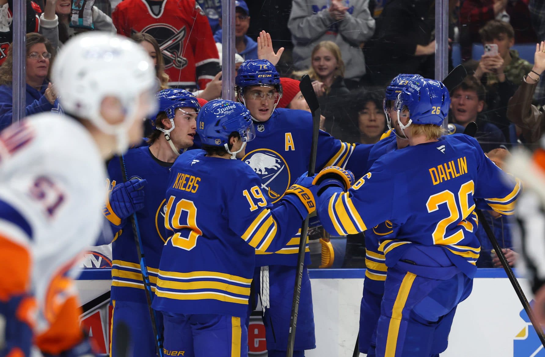 Buffalo Sabres center Tage Thompson (72) celebrates his goal with teammates during the second period against the New York Islanders at KeyBank Center.