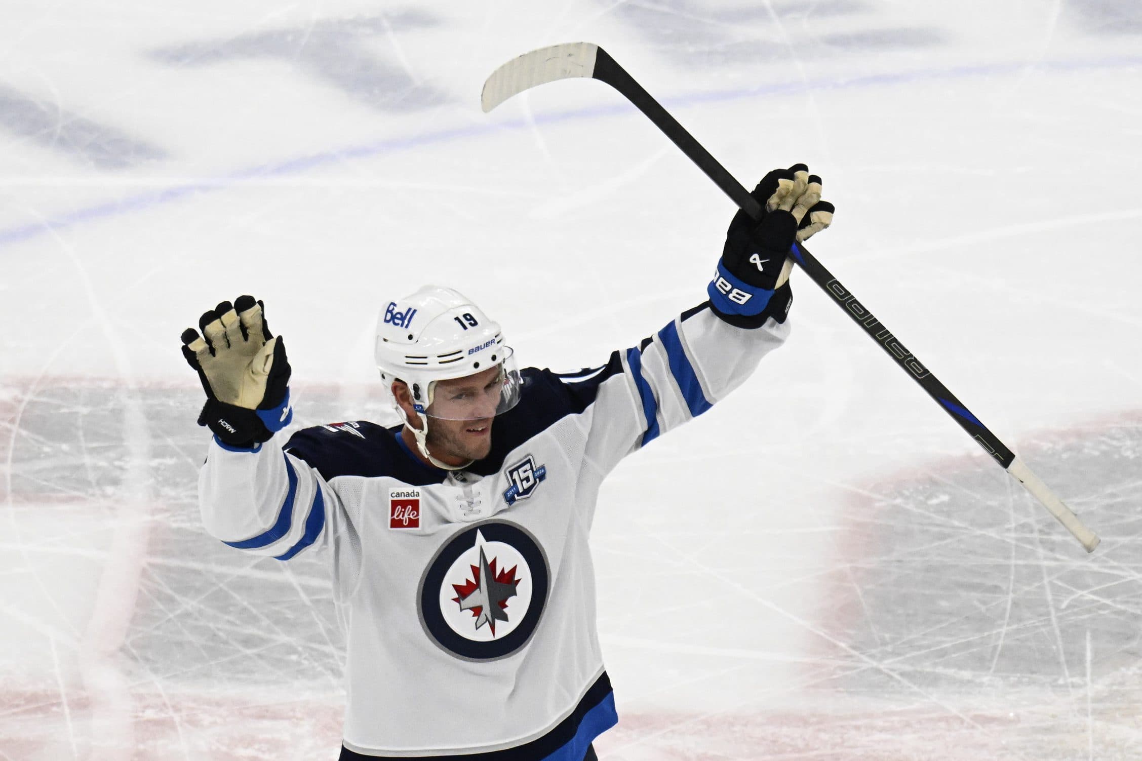 Winnipeg Jets center Jonathan Toews (19) acknowledges the crowd during the first period of his first game back at the United Center since leaving the Chicago Blackhawks.