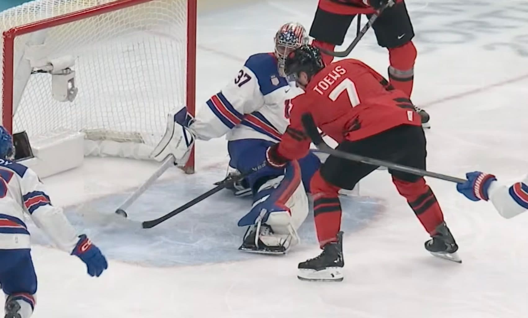 Connor Hellebuyck save on Devon Toews