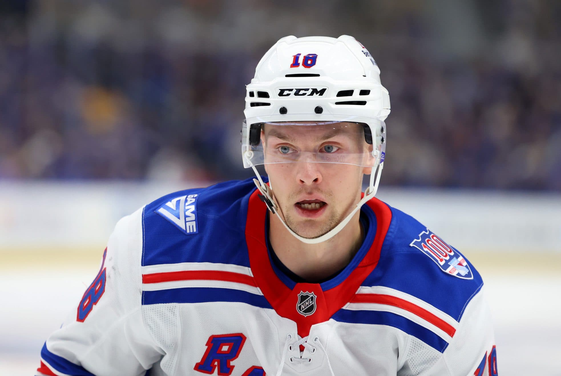 New York Rangers defenseman Urho Vaakanainen (18) goes after a loose puck during the first period against the Buffalo Sabres at KeyBank Center.