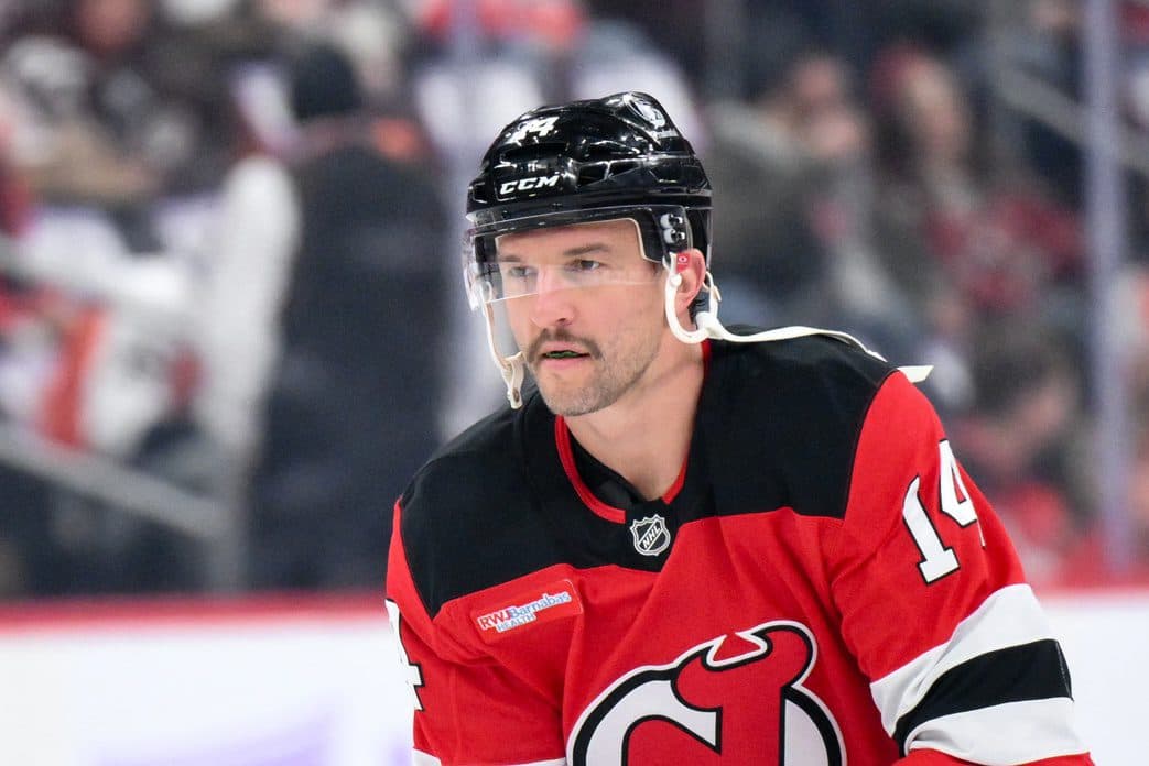 New Jersey Devils center Luke Glendening (14) warms up before a game against the Philadelphia Flyers at Prudential Center.