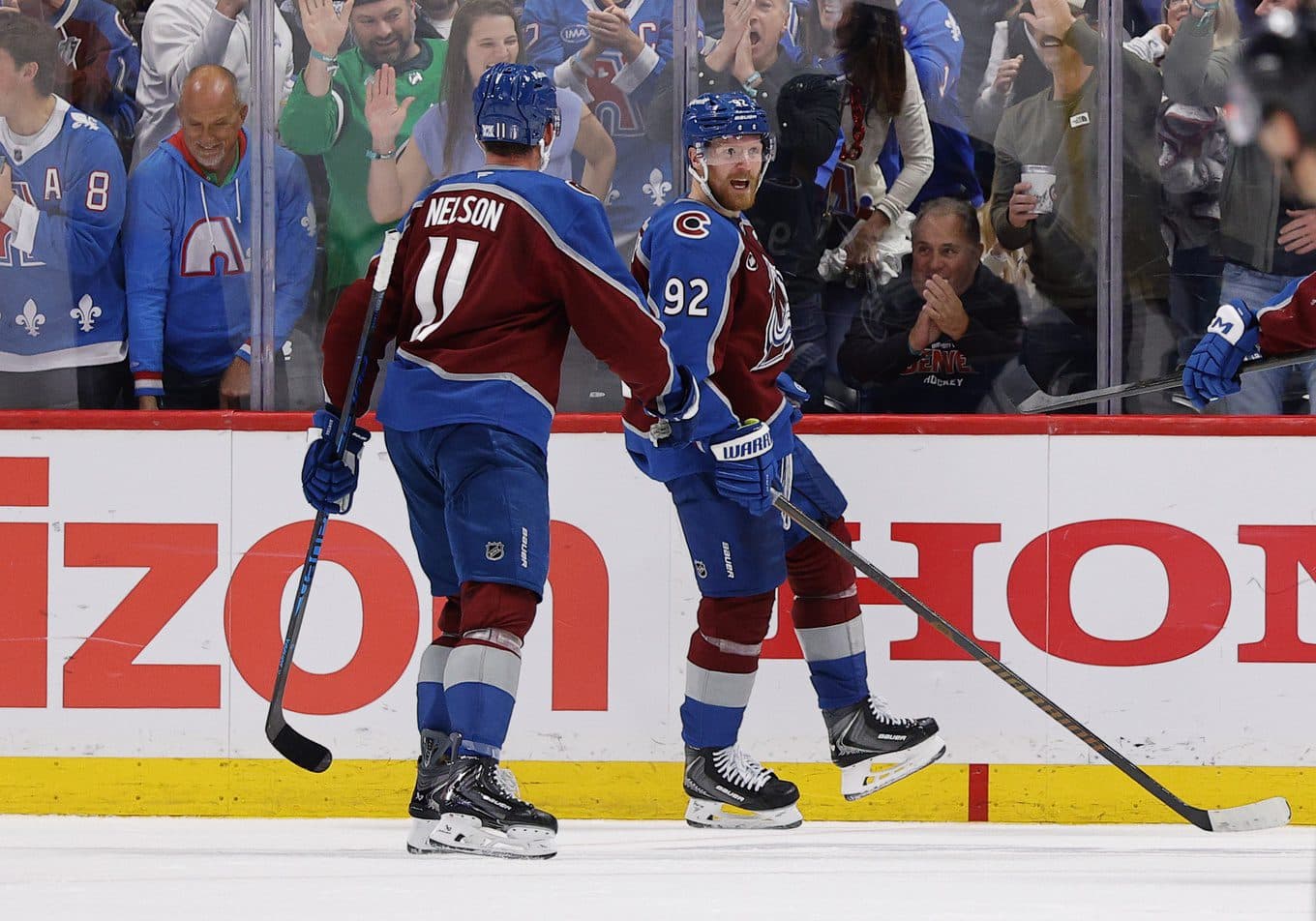 Colorado Avalanche left wing Gabriel Landeskog (92) celebrates with center Brock Nelson (11) after scoring during the third period against the Vegas Golden Knights in game one of the Western Conference Final of the 2026 Stanley Cup Playoffs at Ball Arena.