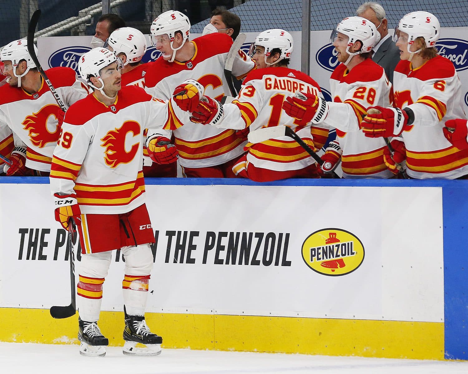 The Calgary Flames have signed Dillon Dube to a three-year contract