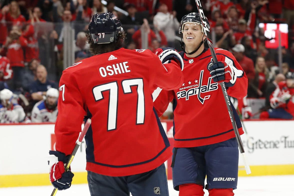 Washington Capitals’ T.J. Oshie and John Carlson both leave game early