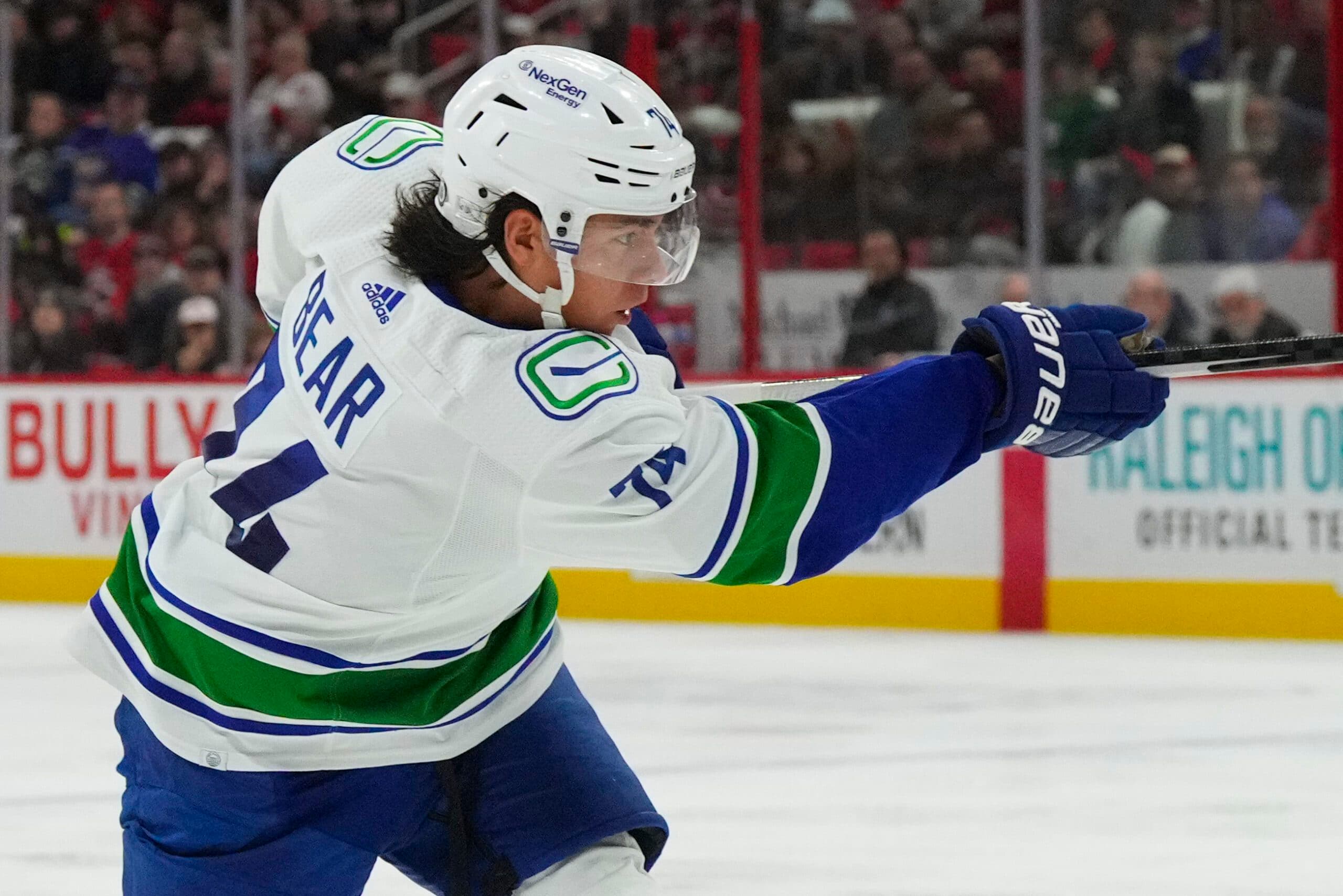 Ethan Bear leaves Vancouver Canucks game with upper-body injury
