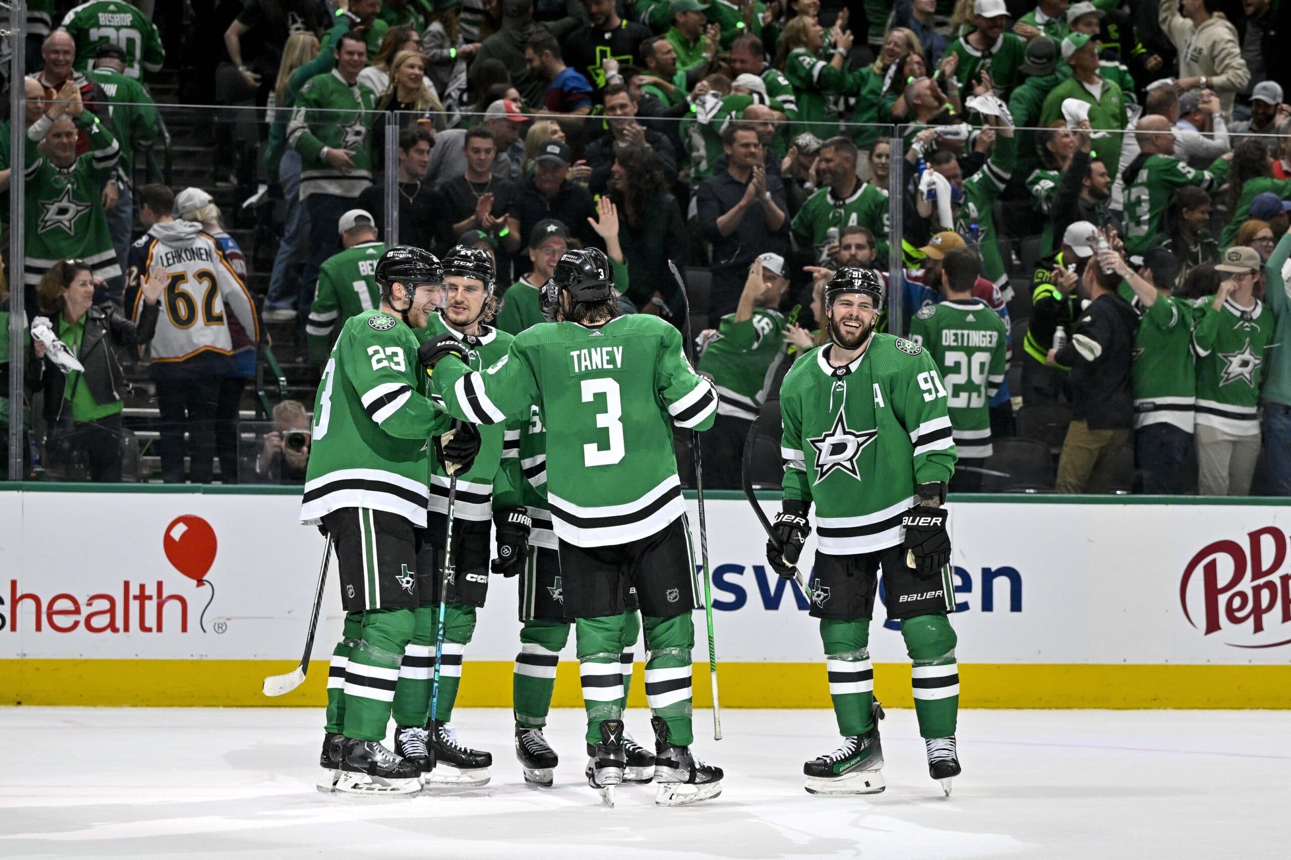 Dallas Stars players Tyler Seguin, Chris Tanev, Roope Hintz and Esa Lindell