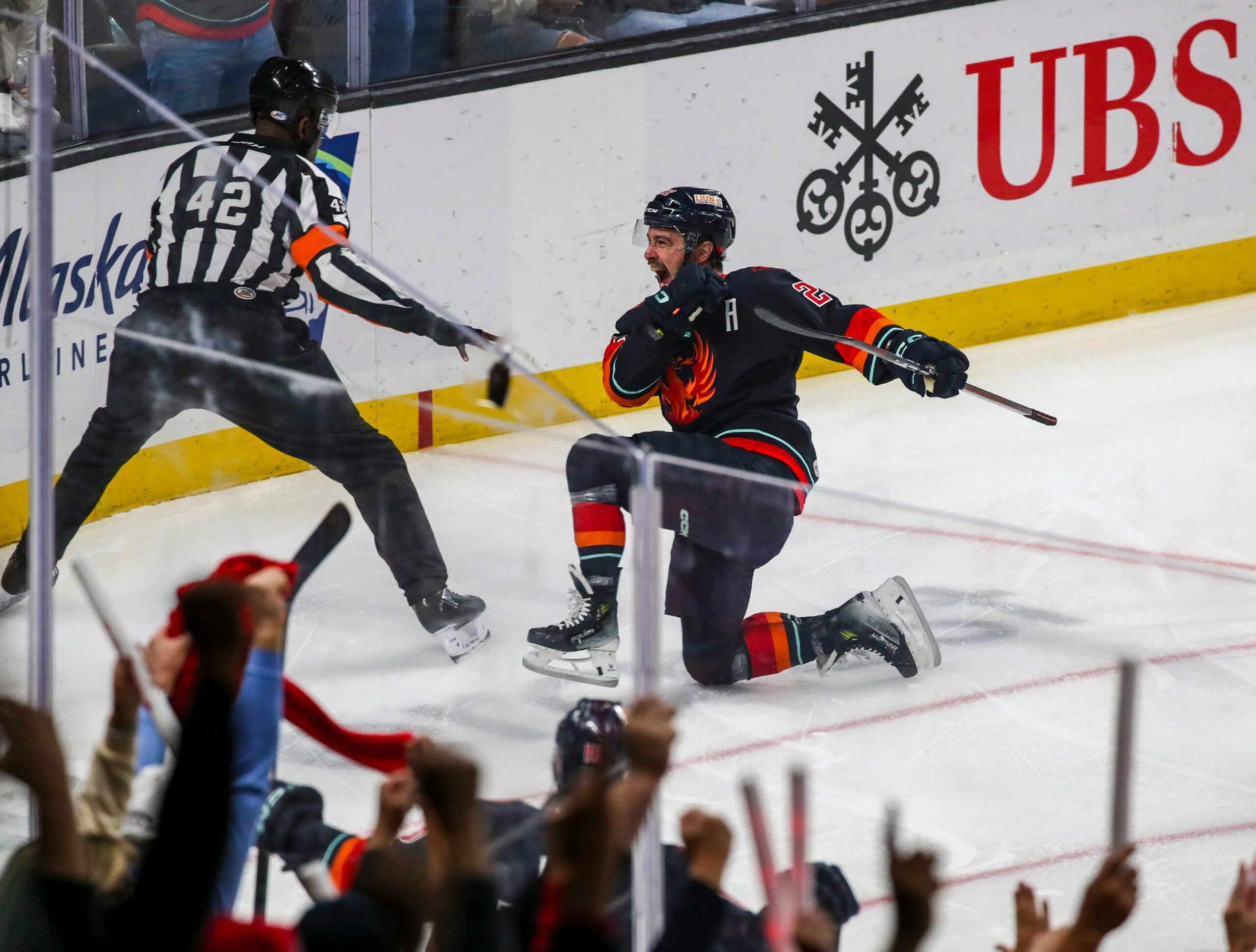 Coachella Valley Firebirds forward Andrew Poturalski scores a goal.