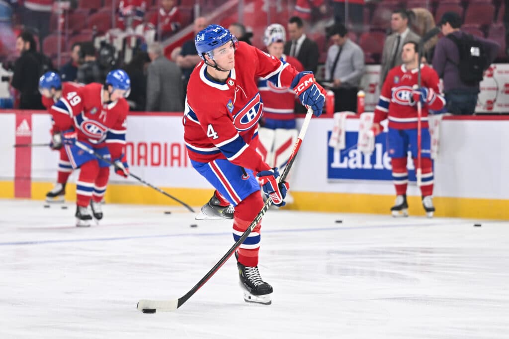 MONTREAL, CANADA - APRIL 16: Logan Mailloux #94 of the Montreal Canadiens shoots the puck during warmups prior to the game against the Detroit Red Wings at the Bell Centre on April 16, 2024 in Montreal, Quebec, Canada. The Detroit Red Wings defeated the Montreal Canadiens 5-4 in a shootout. (Photo by Minas Panagiotakis/Getty Images)