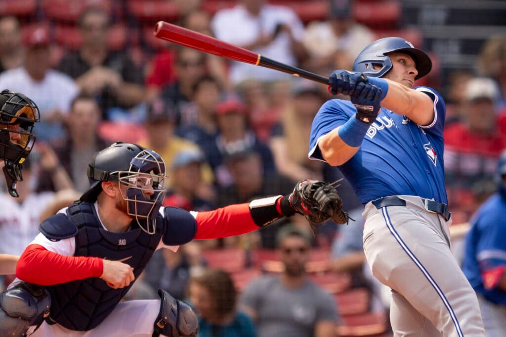 BOSTON, MASSACHUSETTS - AUGUST 26: Danny Jansen #28 of the Boston Red Sox catches as Daulton Varsho #25 of the Toronto Blue Jays bats during the second inning of game one of a doubleheader against the Toronto Blue Jays on August 26, 2024 at Fenway Park in Boston, Massachusetts. Jansen is the first MLB player to play for both teams in one game as the Red Sox and Toronto Blue Jays finish a matchup that was suspended by rain on June 26. (Photo by Maddie Malhotra/Boston Red Sox/Getty Images)