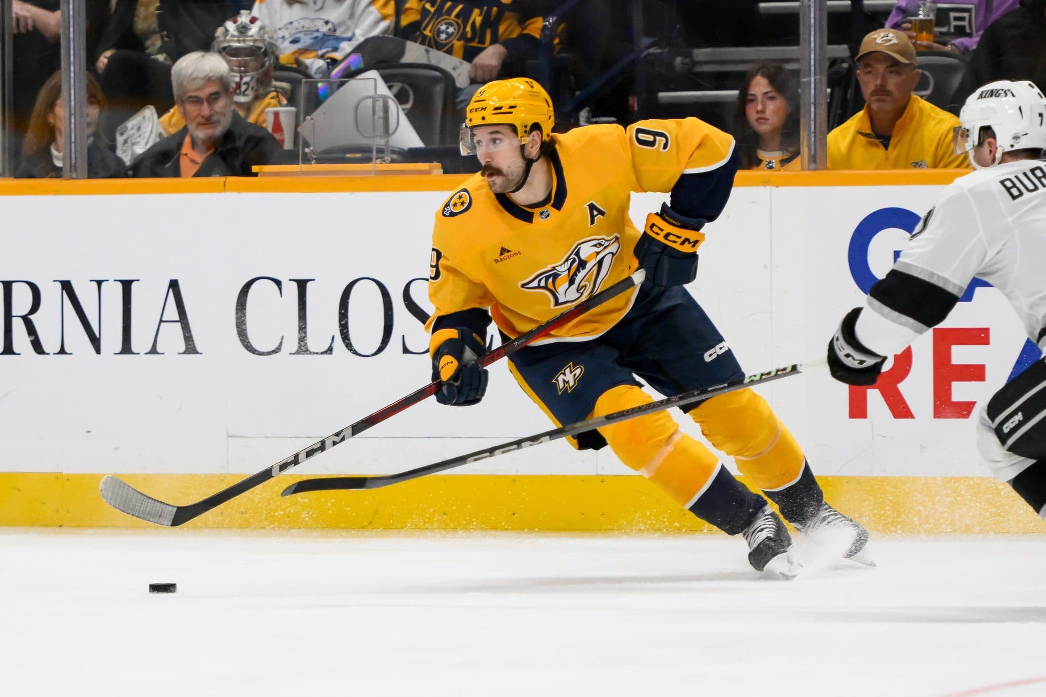 Nashville Predators left wing Filip Forsberg (9) skates with the puck against the Los Angeles Kings during the third period at Bridgestone Arena.