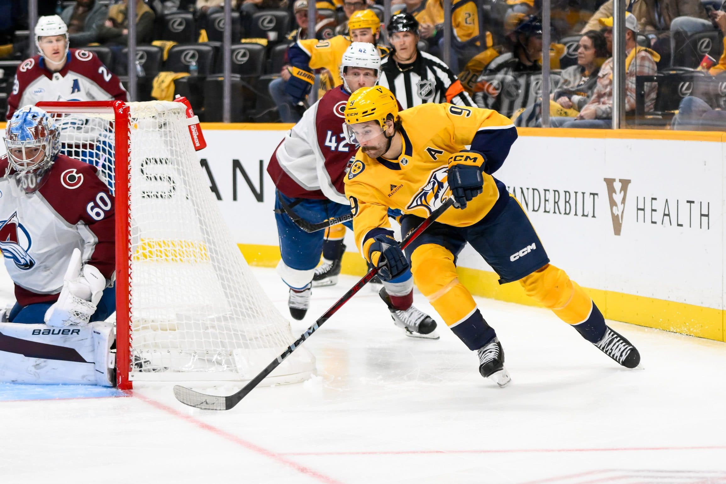 Colorado Avalanche goaltender Justus Annunen (60) blocks the shot of Nashville Predators left wing Filip Forsberg (9) during the third period at Bridgestone Arena.