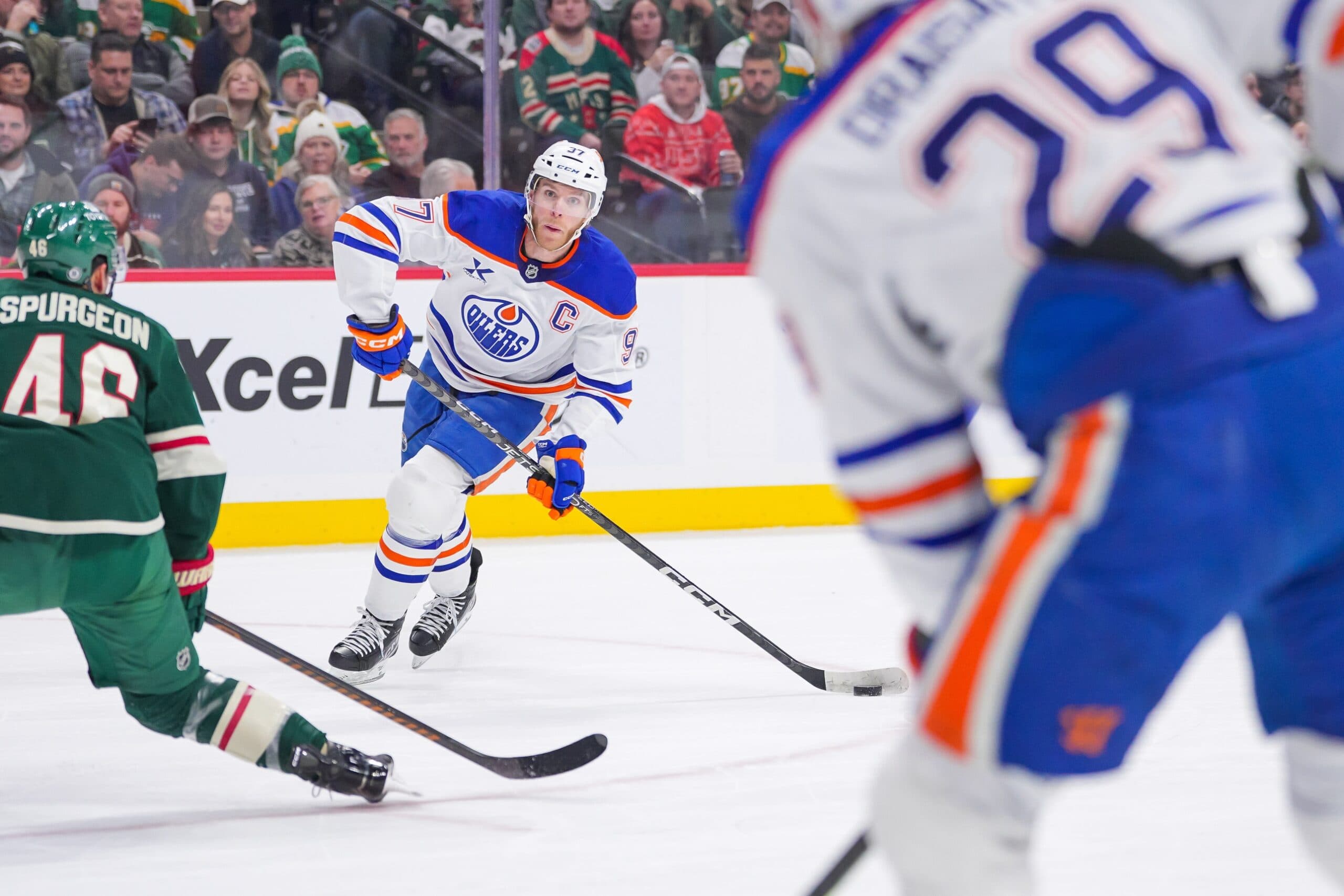 Edmonton Oilers center Connor McDavid (97) passes to center Leon Draisaitl (29) for a goal against the Minnesota Wild in the first period at Xcel Energy Center.