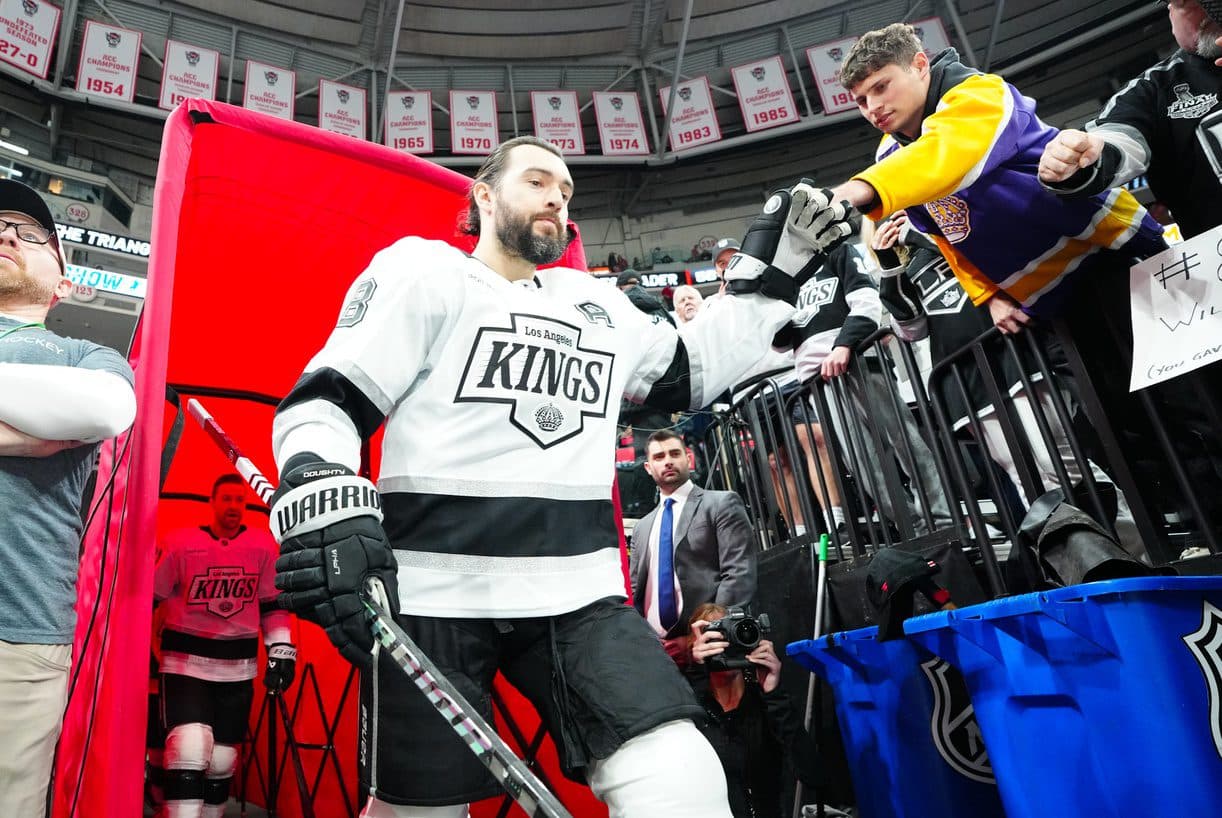 Los Angeles Kings defenseman Drew Doughty (8) goes past the fans on his way to the warmups before the game against the Carolina Hurricanes at Lenovo Center.
