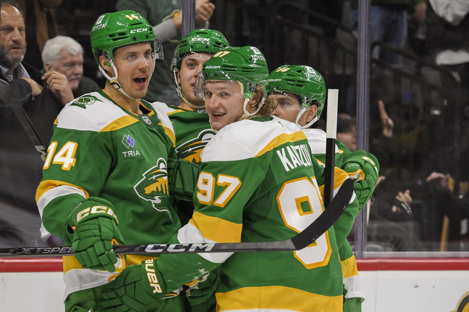 Minnesota Wild forward Joel Eriksson Ek (14) celebrates his goal against the Tampa Bay Lightning with defenseman Brock Faber (7), forward Mats Zuccarello (36), and forward Kirill Kaprizov (97) during the second period at Xcel Energy Center.