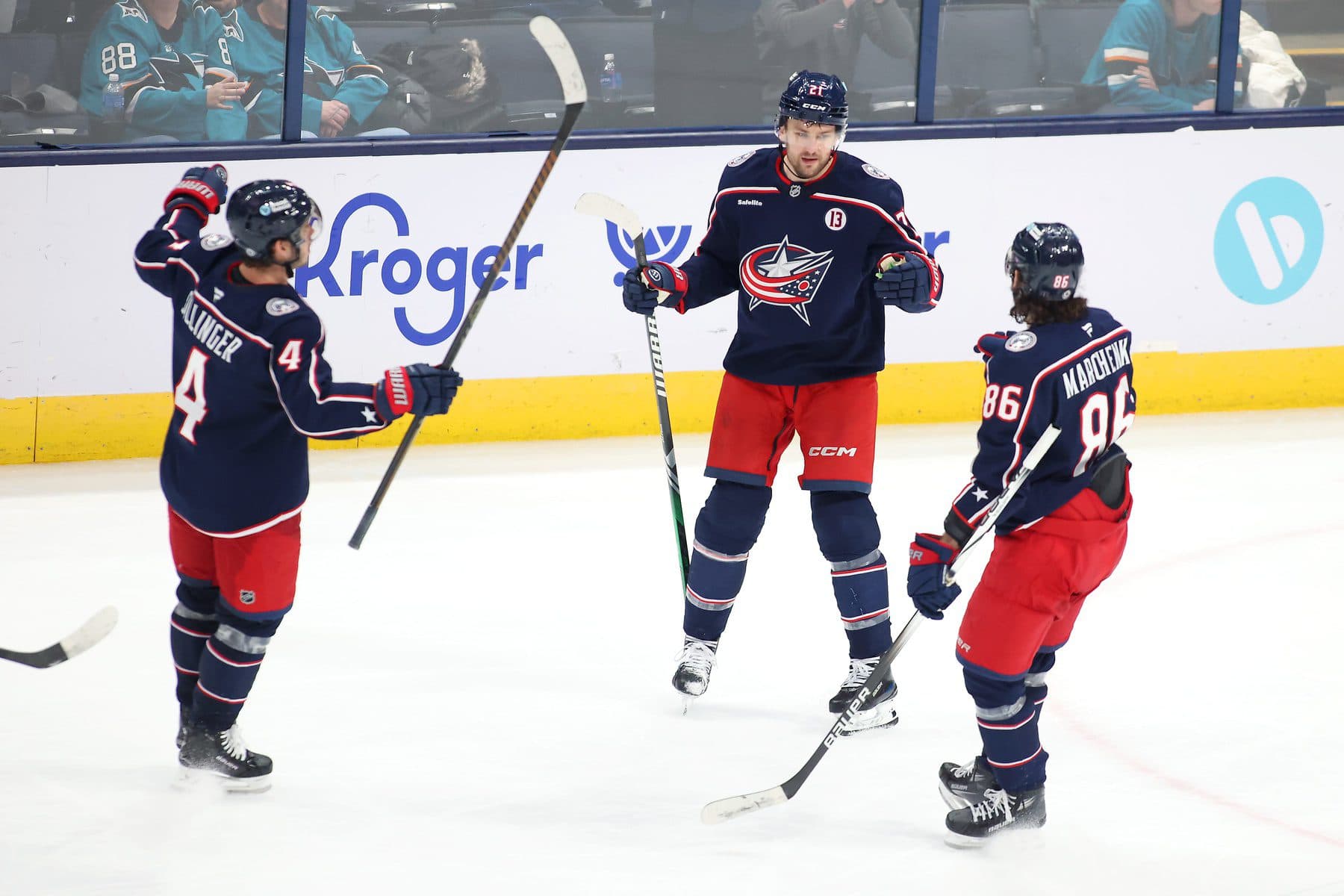 Columbus Blue Jackets left wing James van Riemsdyk (21) celebrates his goal with center Cole Sillinger (4) and right wing Kirill Marchenko (86) during the third period against the San Jose Sharks at Nationwide Arena.