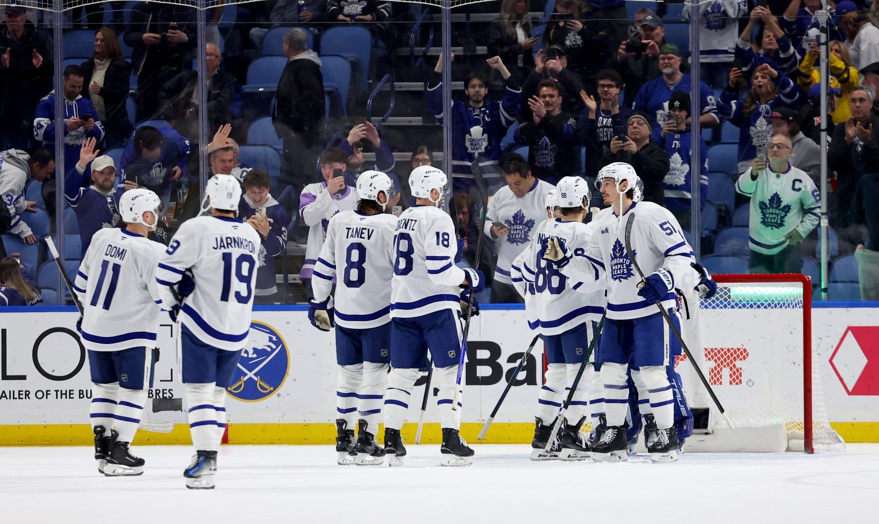The Toronto Maple Leafs celebrate a win over the Buffalo Sabres at KeyBank Center.