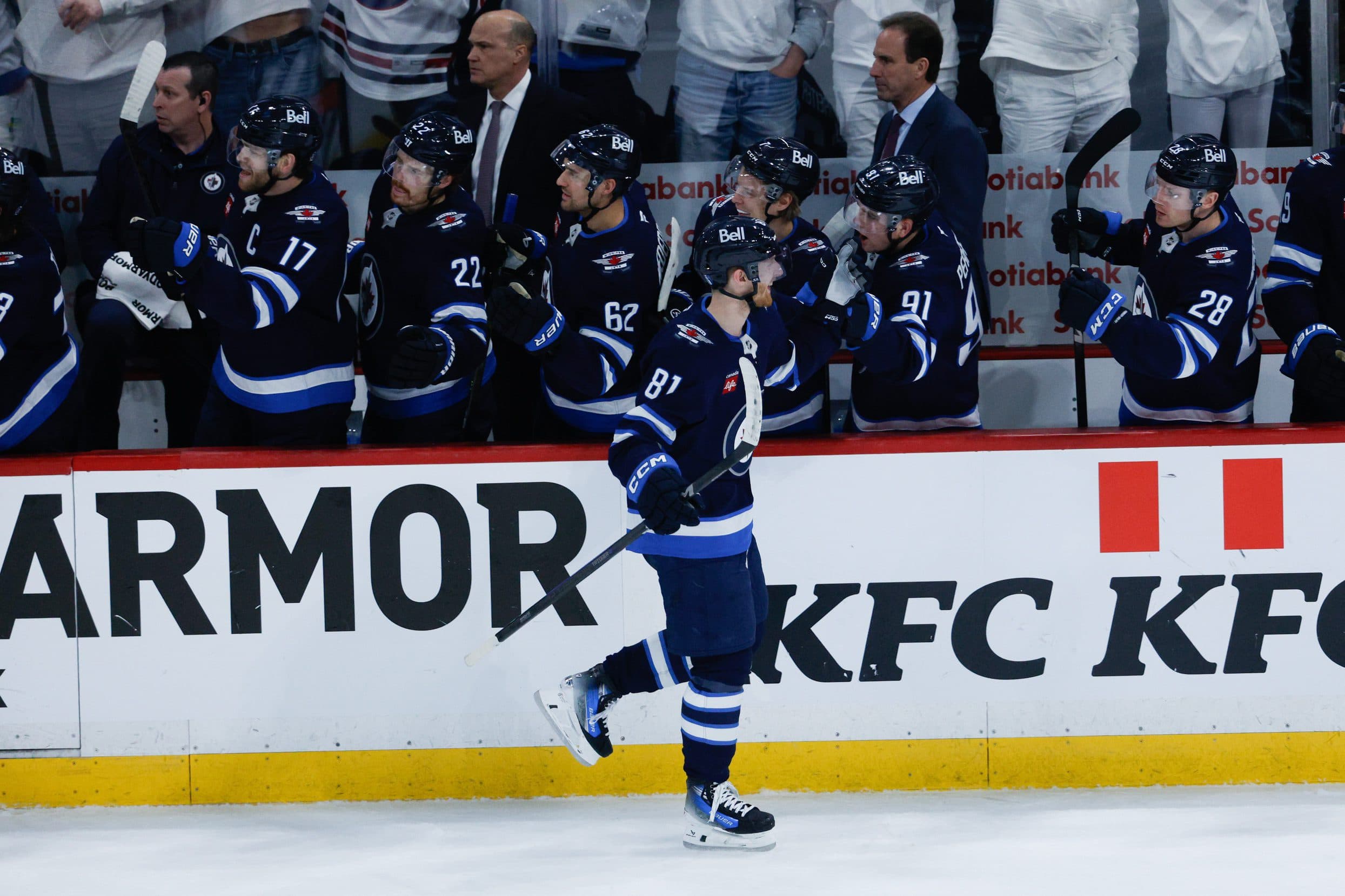 Winnipeg Jets forward Kyle Connor (81) is congratulated by his team mates on his goal against the St. Louis Blues during the third period in game one of the first round of the 2025 Stanley Cup Playoffs at Canada Life Centre.