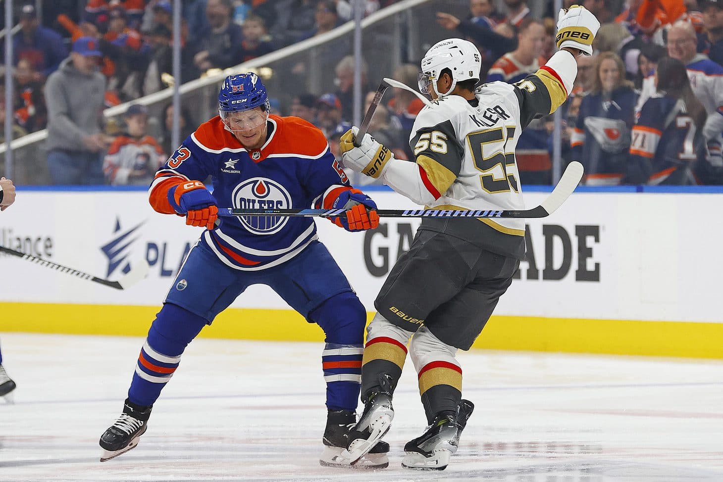 Edmonton Oilers forward Jeff Skinner (53) and Vegas Golden Knights forward Keegan Kolesar (55) battle for position during the first period at Rogers Place.