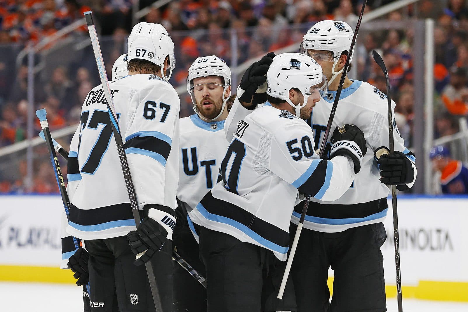 The Utah Hockey Club celebrate a goal scored by Utah Hockey Club defensemen Sean Durzi (50) during the second period against the Edmonton Oilers at Rogers Place.