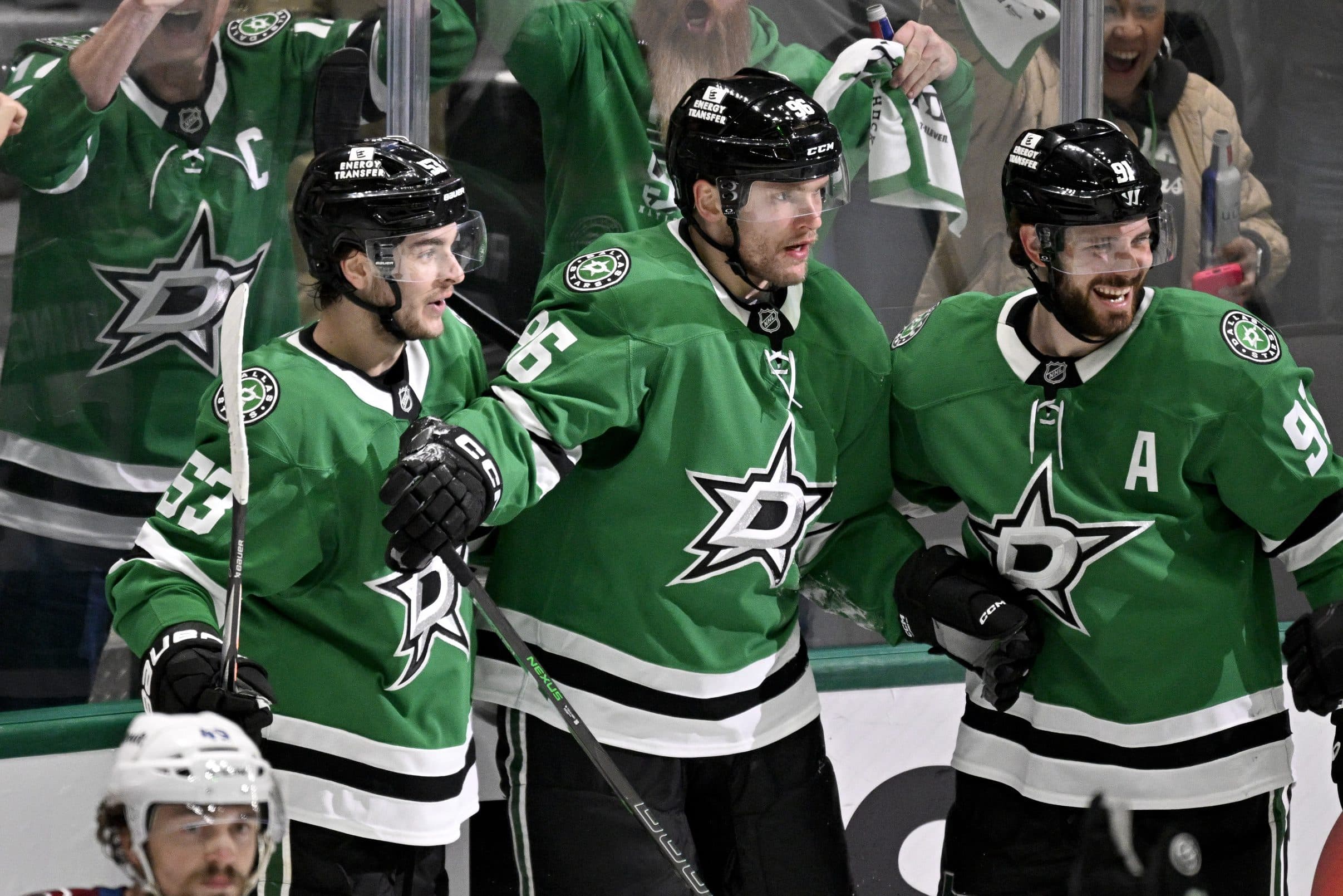 Dallas Stars right wing Mikko Rantanen (96) and center Tyler Seguin (91) and center Wyatt Johnston (53) celebrates the game tying goal goal scored by Rantanen against the Colorado Avalanche during the third period in game seven of the first round of the 2025 Stanley Cup Playoffs at American Airlines Center.