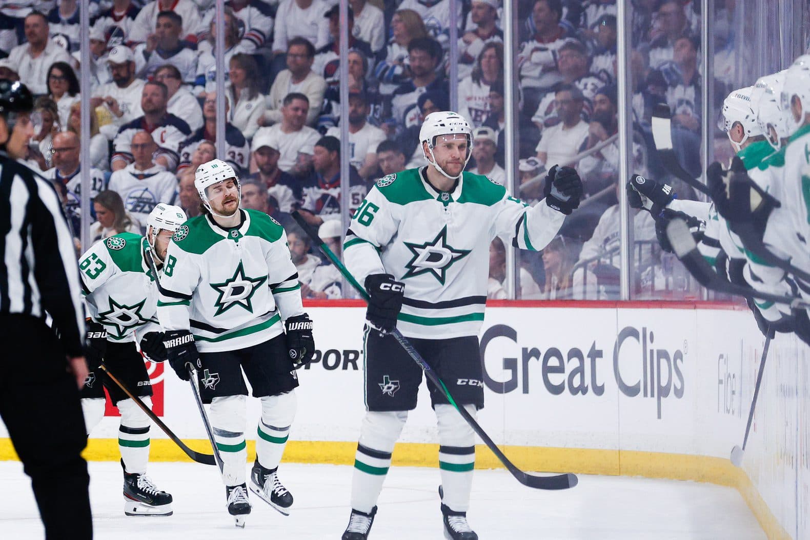 Dallas Stars forward Mikko Rantanen (96) is congratulated by his team mates against the Winnipeg Jets during the second period in game one of the second round of the 2025 Stanley Cup Playoffs at Canada Life Centre.