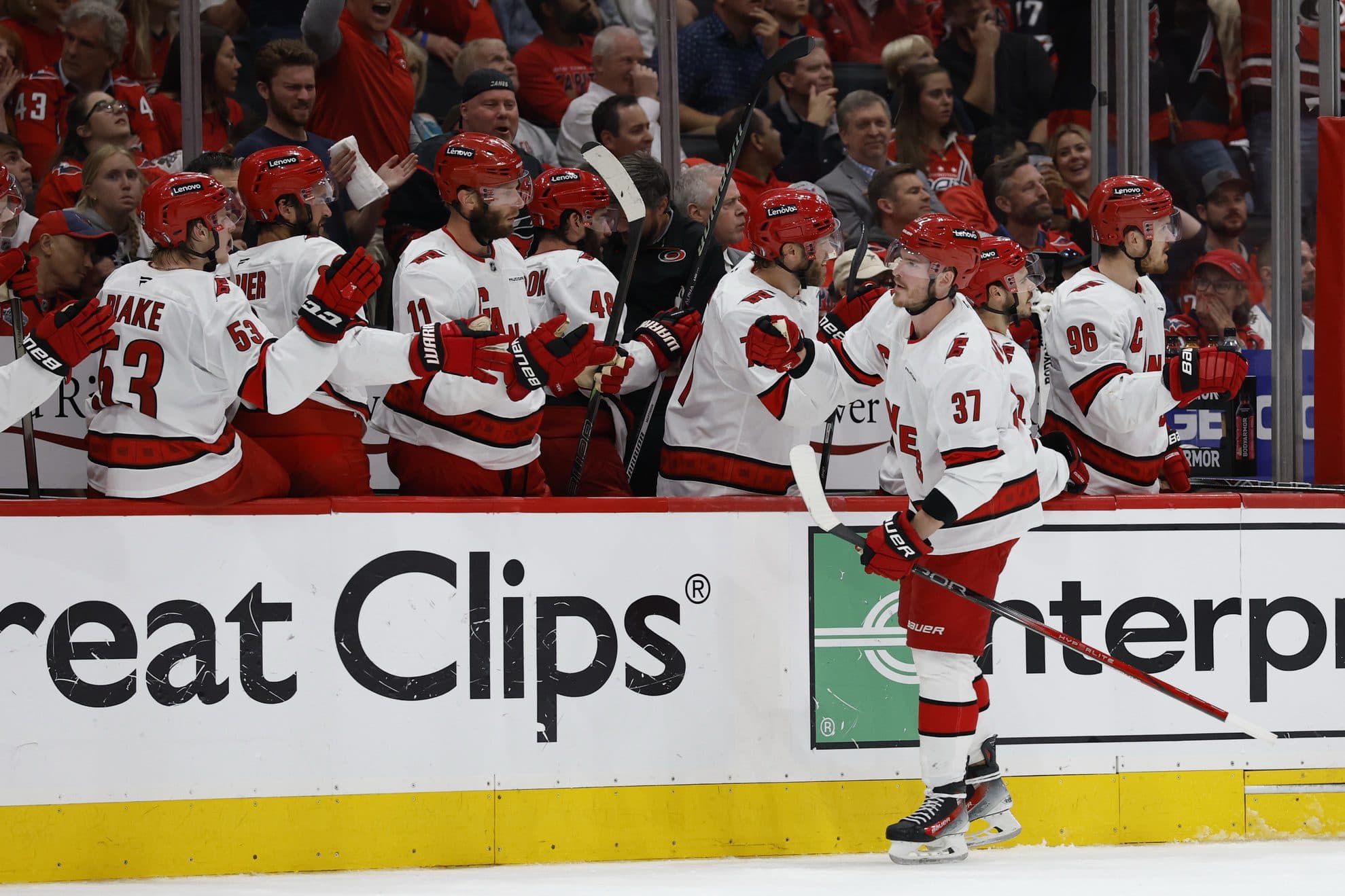 Carolina Hurricanes right wing Andrei Svechnikov (37) celebrates with teammates after scoring the go ahead goal against the Washington Capitals late in the third period in game five of the second round of the 2025 Stanley Cup Playoffs at Capital One Arena.