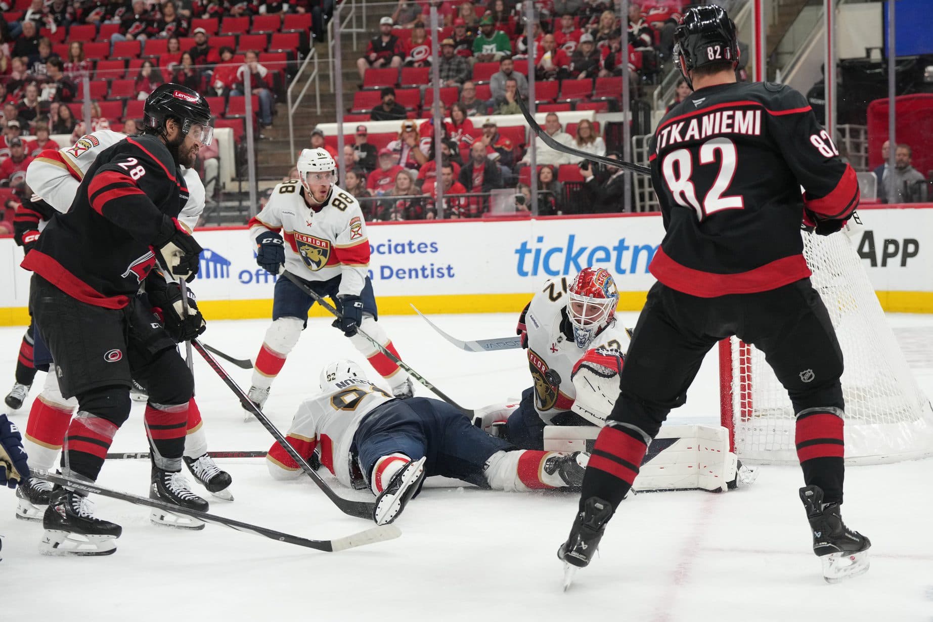 Florida Panthers goaltender Sergei Bobrovsky (72) and Florida Panthers forward Tomas Nosek (92) defend against Carolina Hurricanes forward Jesperi Kotkaniemi (82) and forward William Carrier (28) during the third period in game one of the Eastern Conference Final of the 2025 Stanley Cup Playoffs at Lenovo Center.