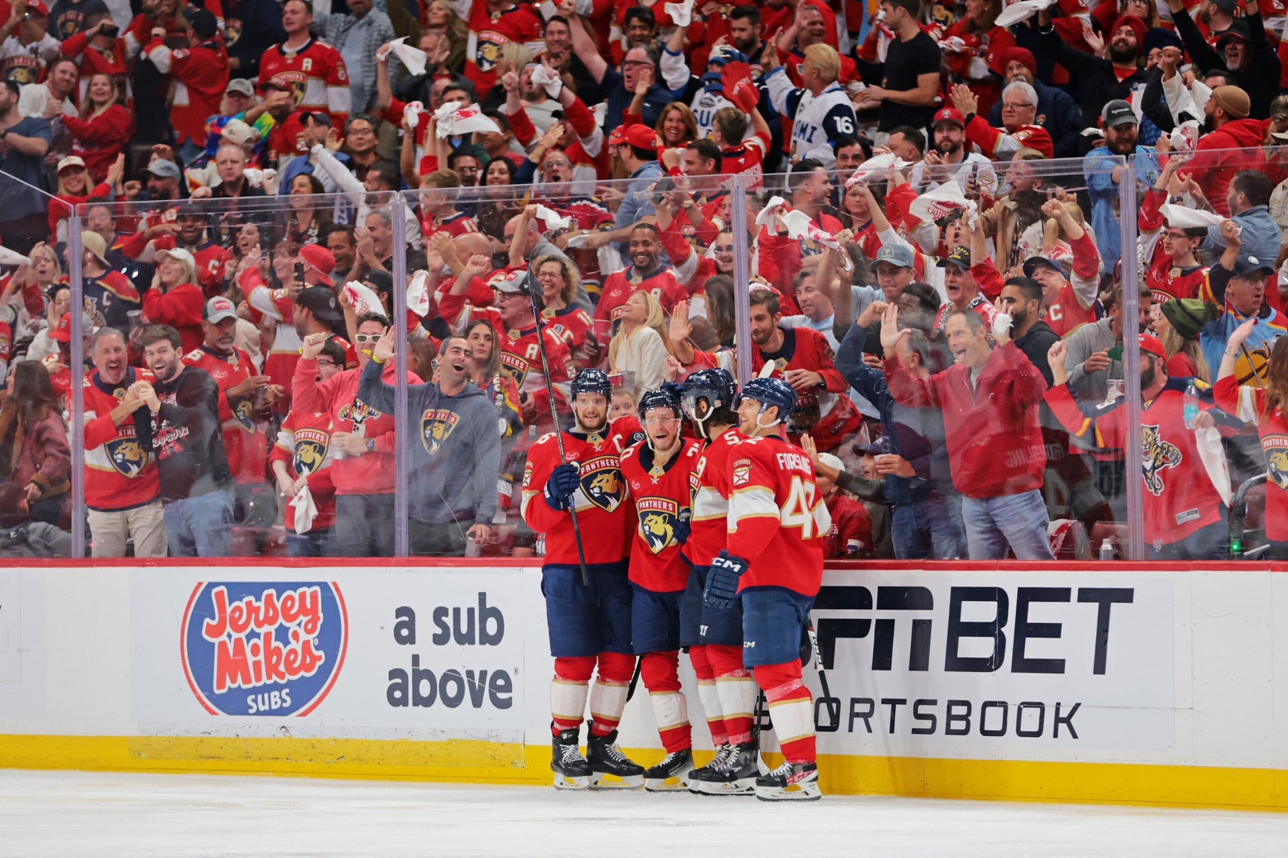 Florida Panthers center Jesper Boqvist (70) celebrates with teammates after a goal during the third period against the Carolina Hurricanes in game three of the Eastern Conference Final of the 2025 Stanley Cup Playoffs at Amerant Bank Arena.