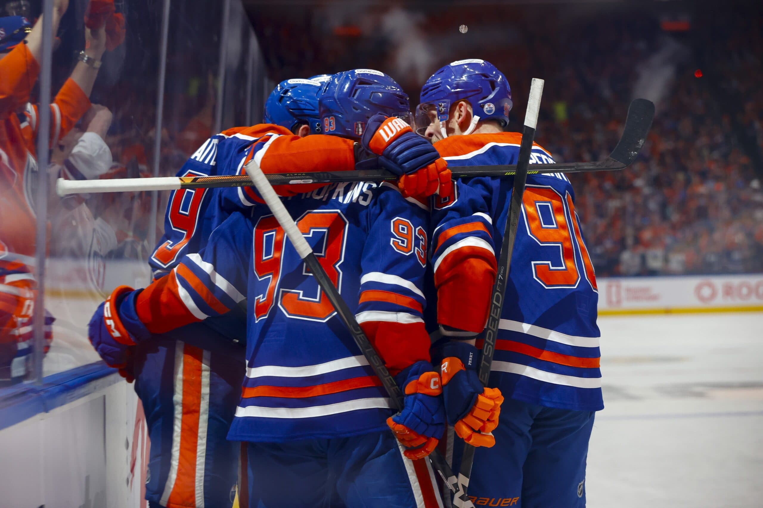 Edmonton Oilers center Leon Draisaitl (29) and center Ryan Nugent-Hopkins (93) and right wing Corey Perry (90) celebrates Draisaitl scoring a power play goal against the Dallas Stars during the first period in game four of the Western Conference Final of the 2025 Stanley Cup Playoffs at Rogers Place.