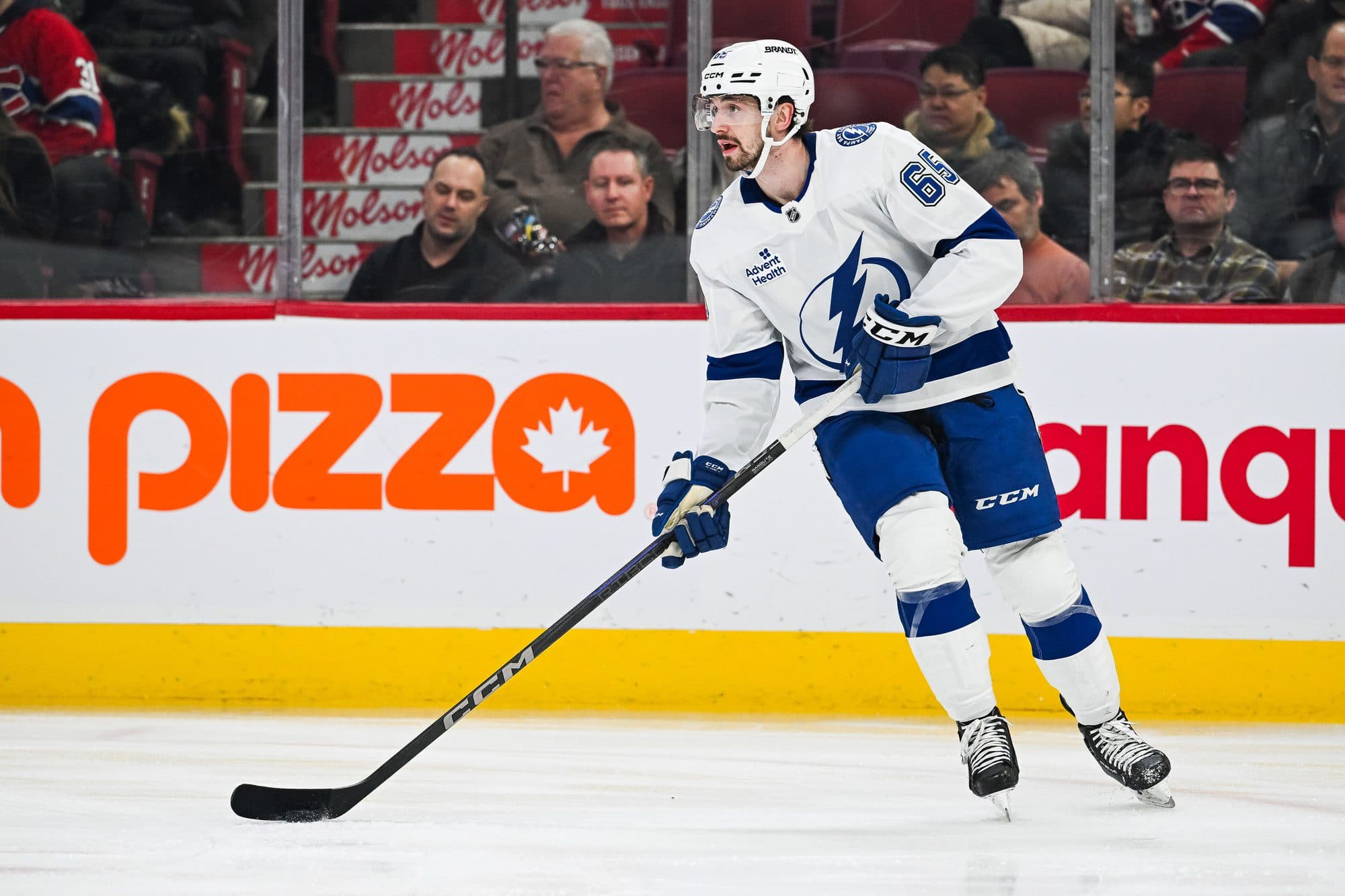 Tampa Bay Lightning defenseman Maxwell Crozier (65) plays the puck against the Montreal Canadiens during the first period at Bell Centre.