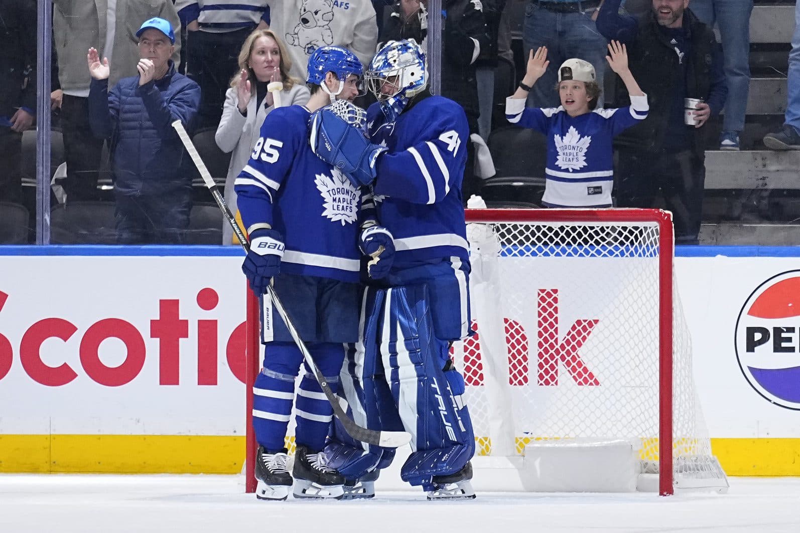 Toronto Maple Leafs defenceman Oliver Ekman-Larsson (95) and Toronto Maple Leafs goaltender Anthony Stolarz (41) celebrate a win over the Ottawa Senators in game one of the first round of the 2025 Stanley Cup Playoffs at Scotiabank Arena.
