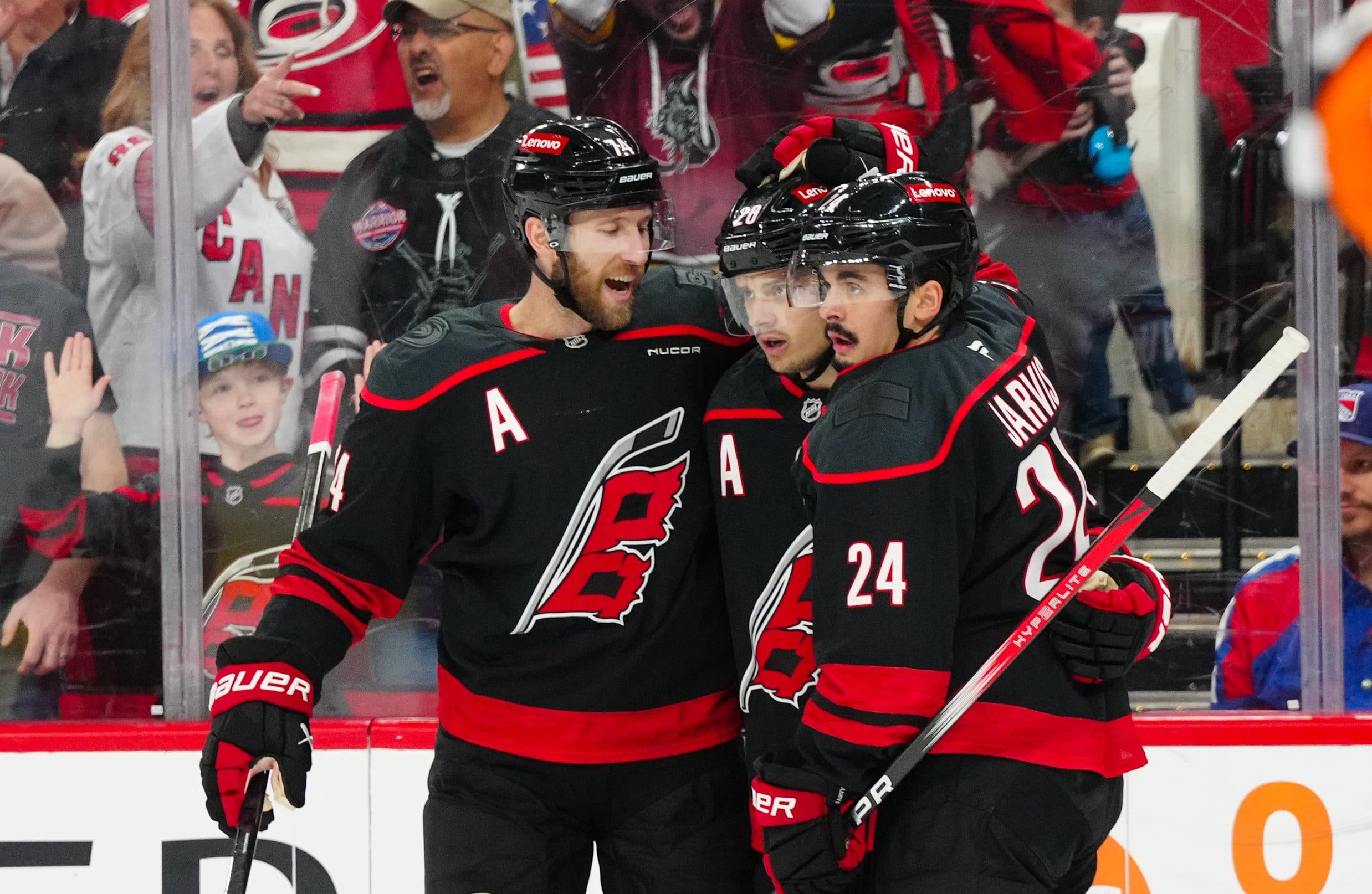 Jaccob Slavin, Sebastian Aho and Seth Jarvis