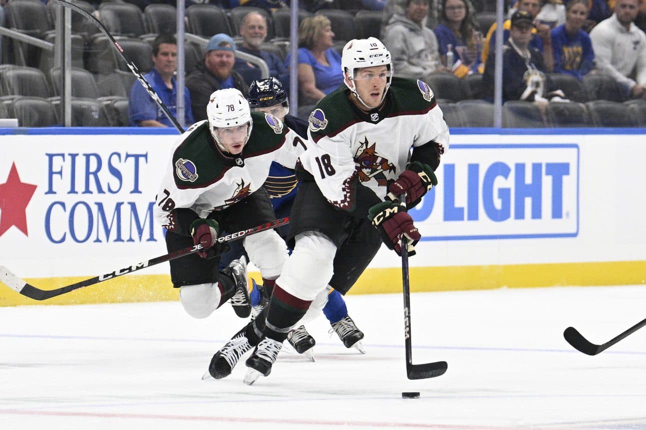 Arizona Coyotes forward Austin Poganski (18) skates against the St. Louis Blues during the first period at Enterprise Center.
