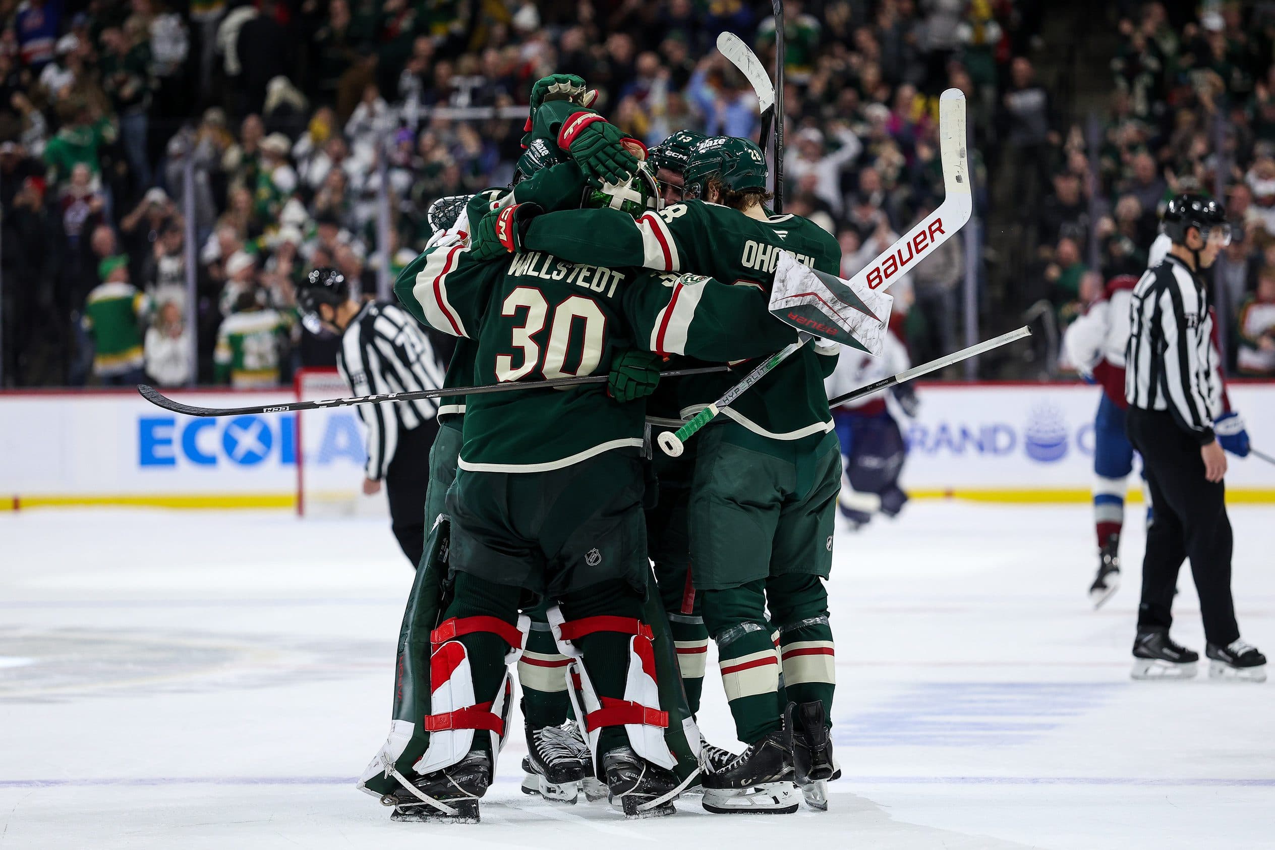 Minnesota Wild goaltender Jesper Wallstedt (30) celebrates the teams shootout win against the Colorado Avalanche at Grand Casino Arena.