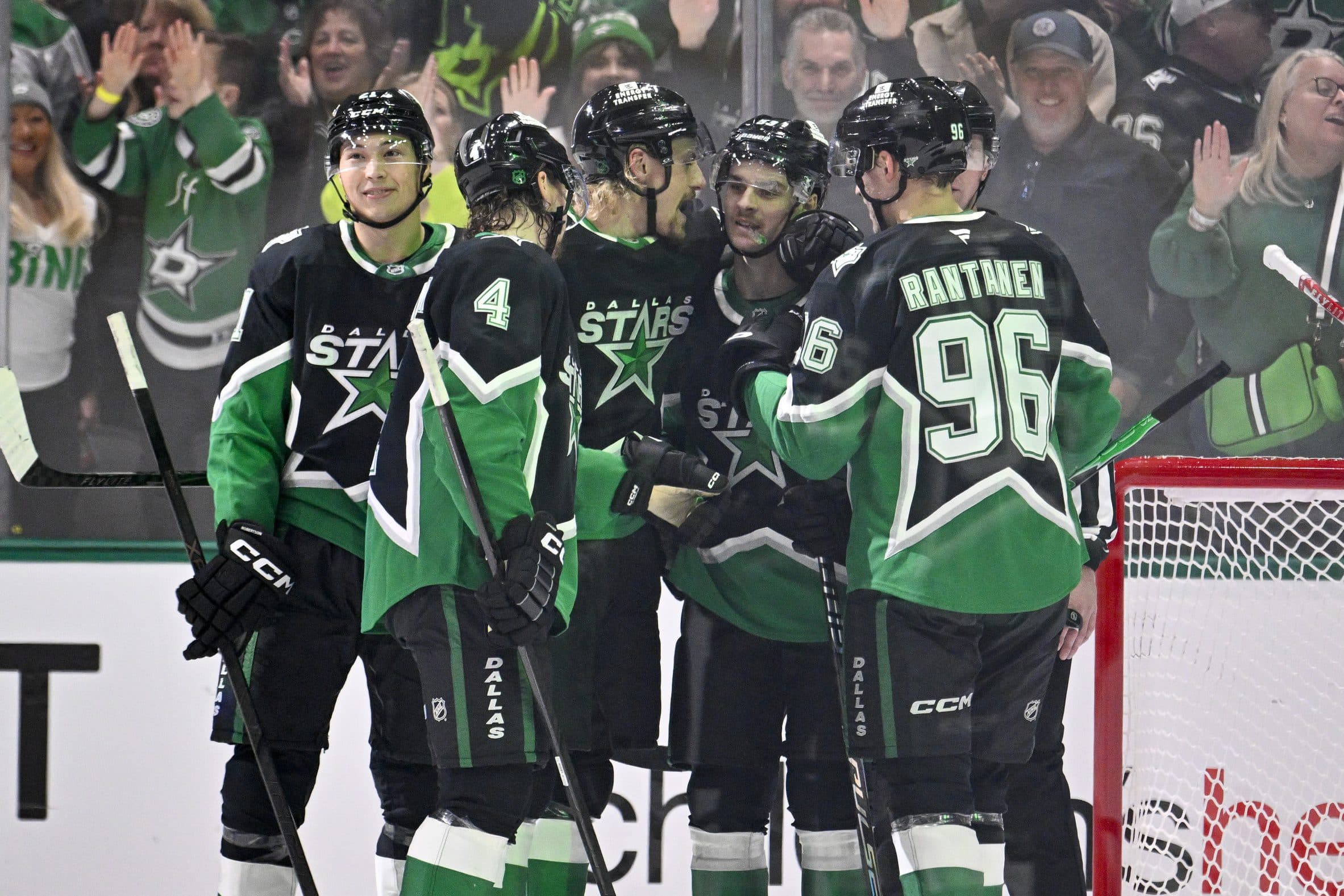 Dallas Stars center Roope Hintz (24) and center Wyatt Johnston (53) and defenseman Miro Heiskanen (4) and left wing Jason Robertson (21) and right wing Mikko Rantanen (96) celebrates the third goal scored by Johnston during the third period against the Ottawa Senators at the American Airlines Center.
