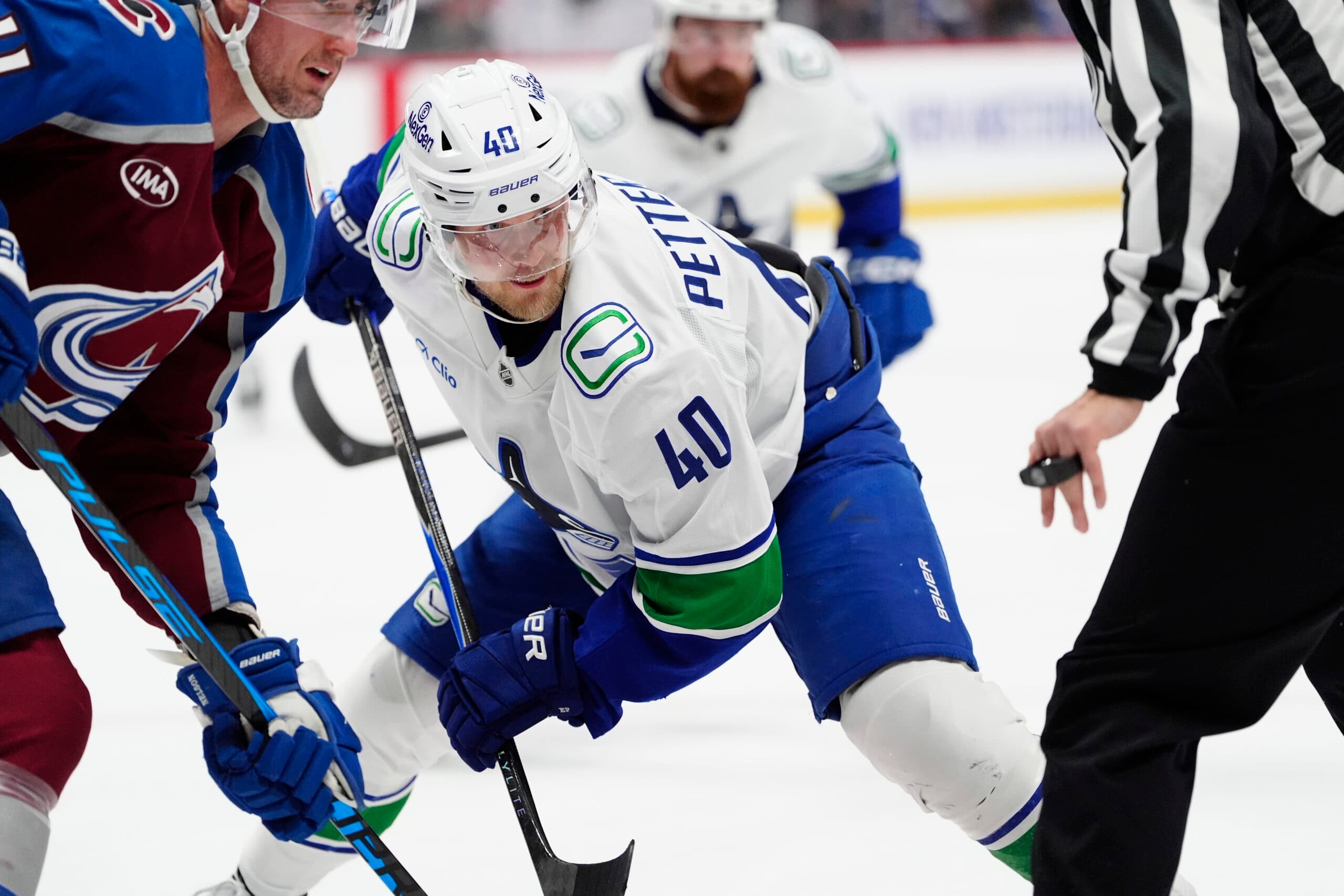 Canucks place Elias Pettersson on injured reserve; Marco Rossi activated