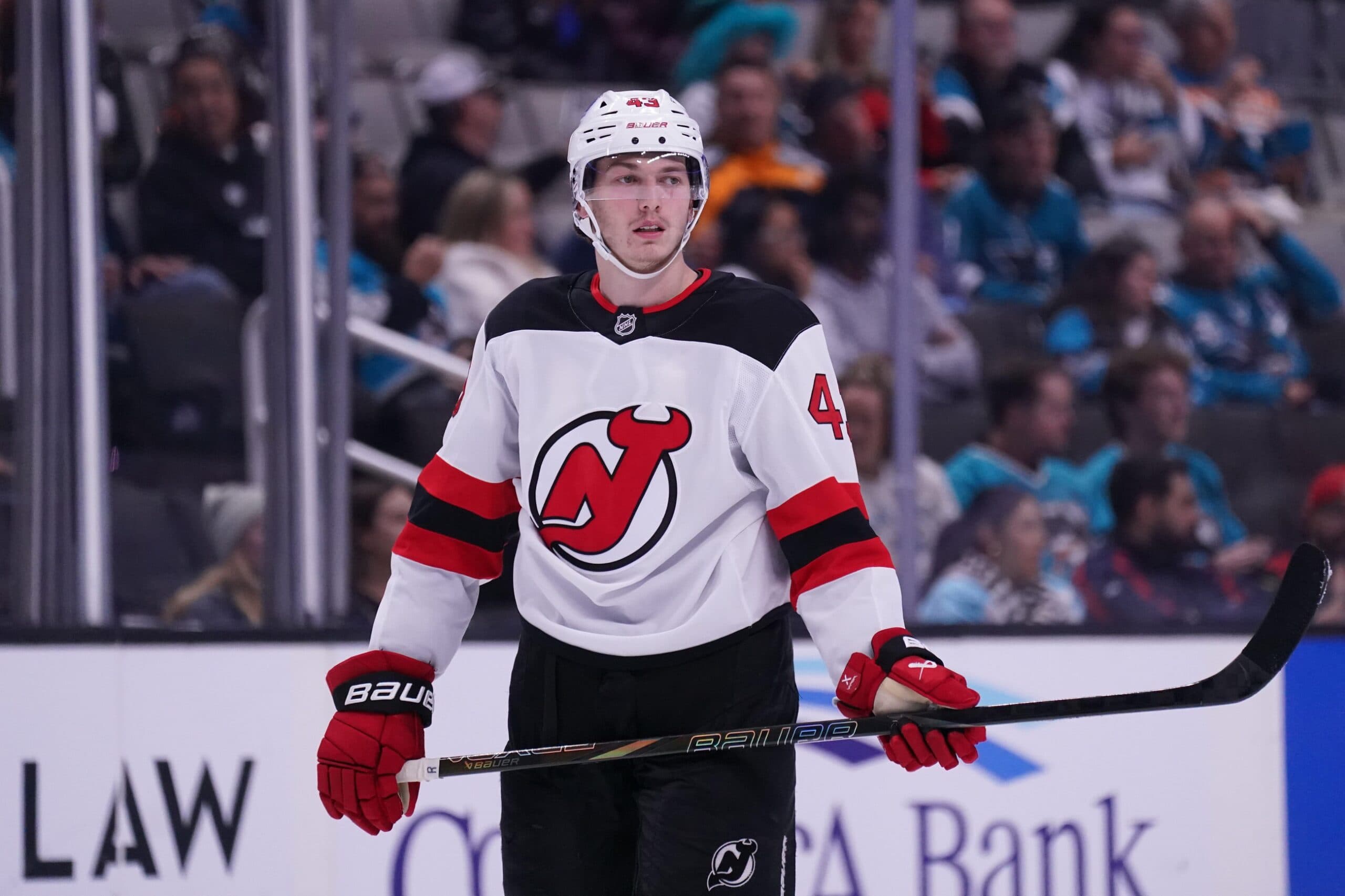 Report: Devils’ Luke Hughes dislocates shoulder against Flames