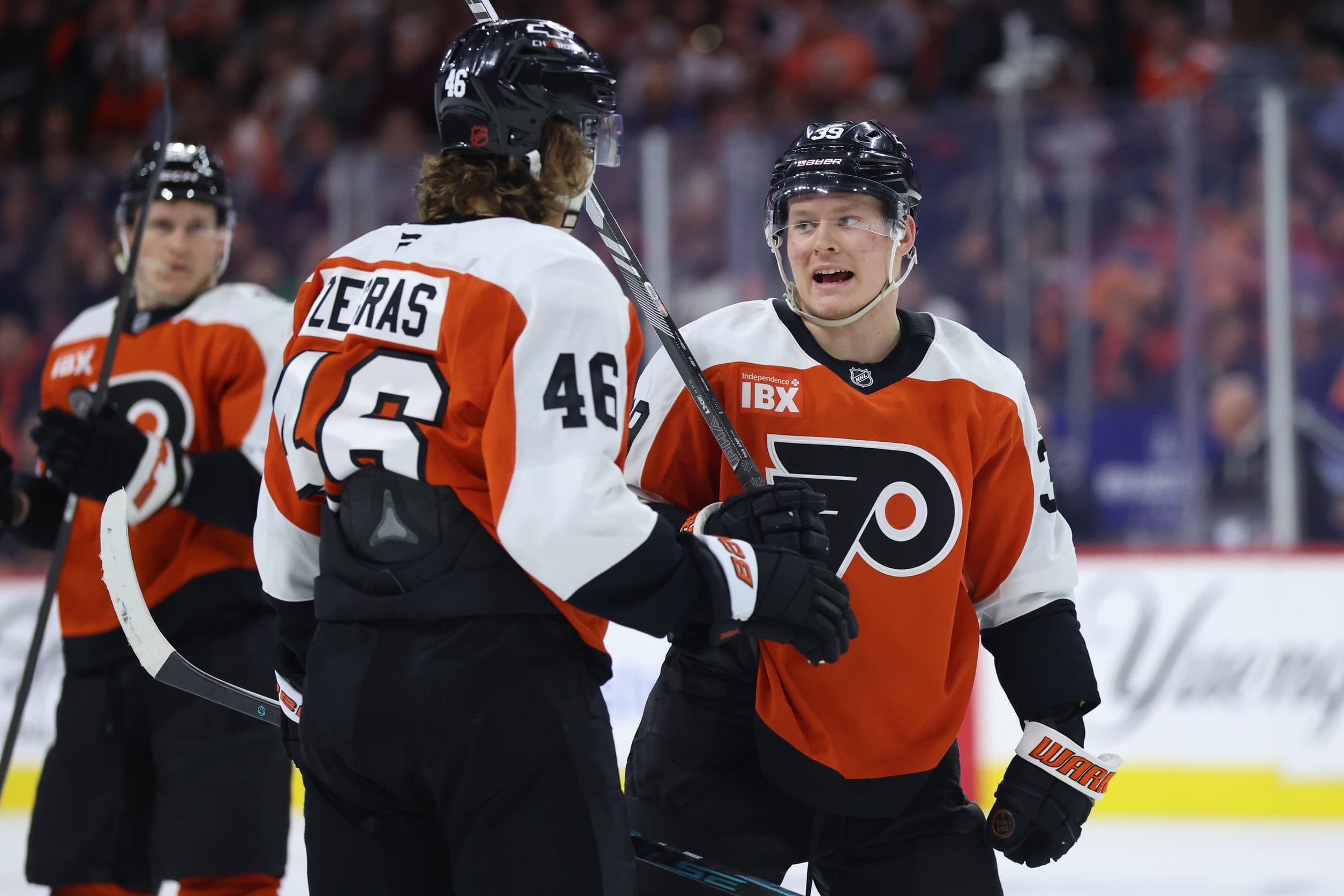 Philadelphia Flyers right wing Matvei Michkov (39) and center Trevor Zegras (46) talk during the third period against the Toronto Maple Leafs at Xfinity Mobile Arena.