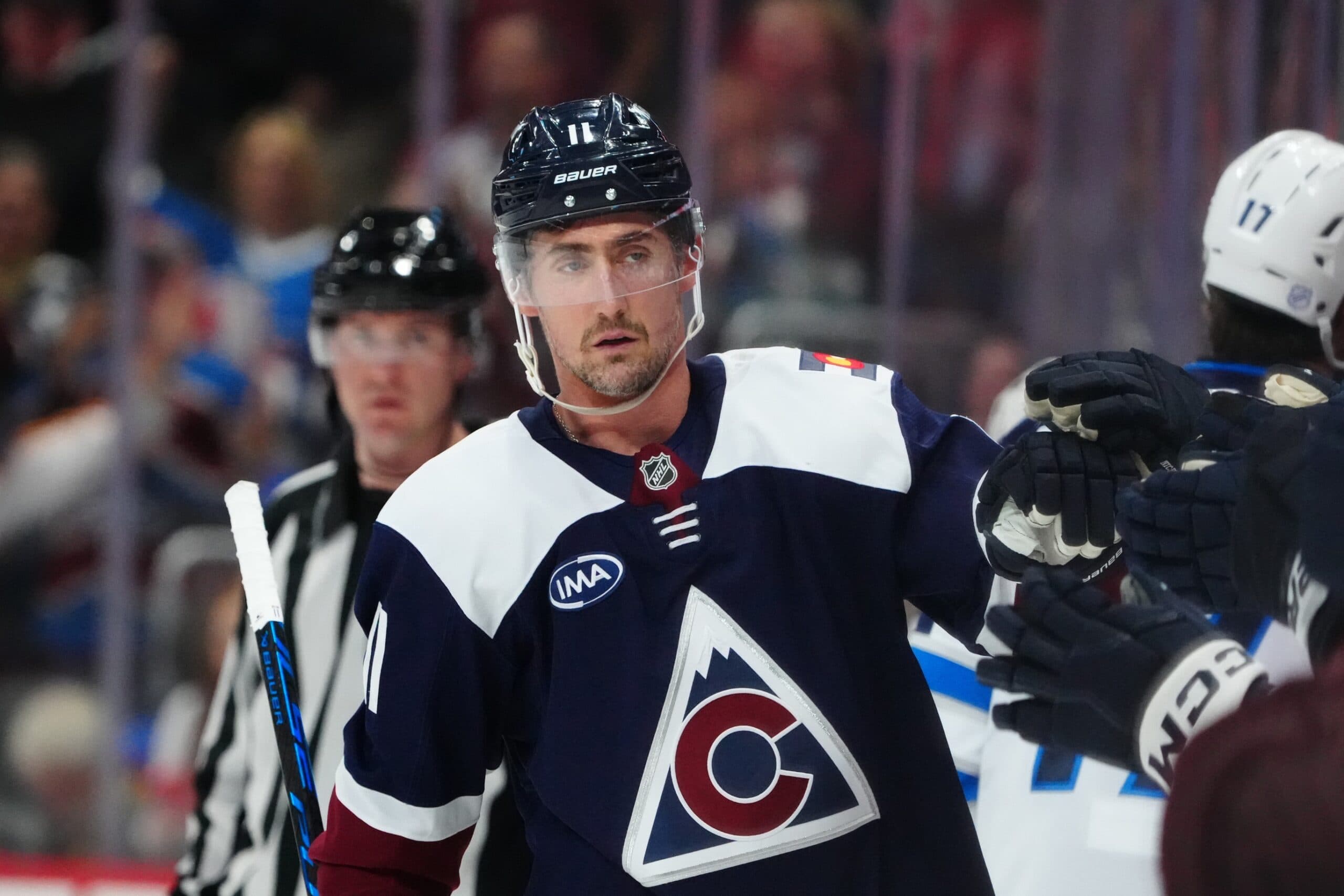 Colorado Avalanche center Brock Nelson (11) celebrates his goal in the first period against the Winnipeg Jets at Ball Arena.