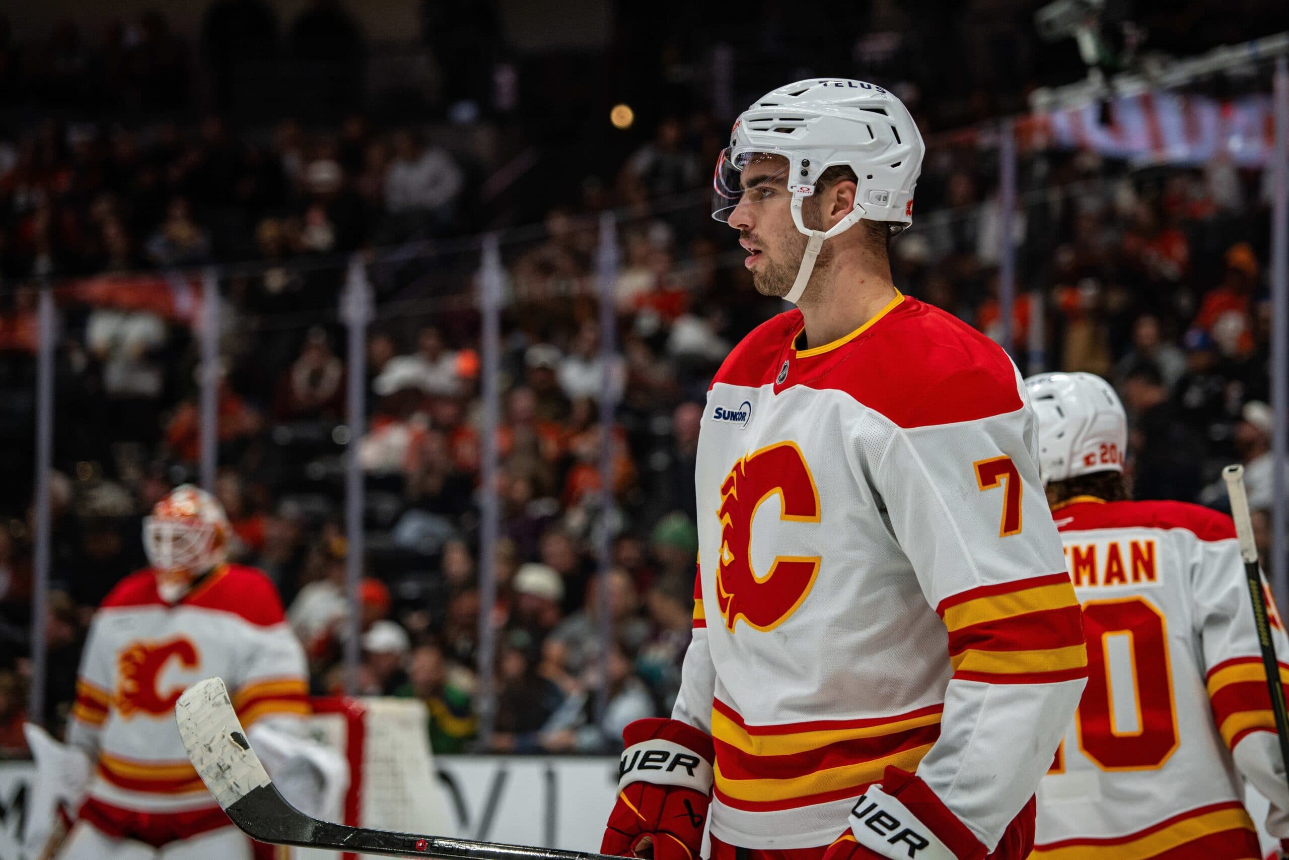 Flames’ Kevin Bahl leaves game with lower-body injury