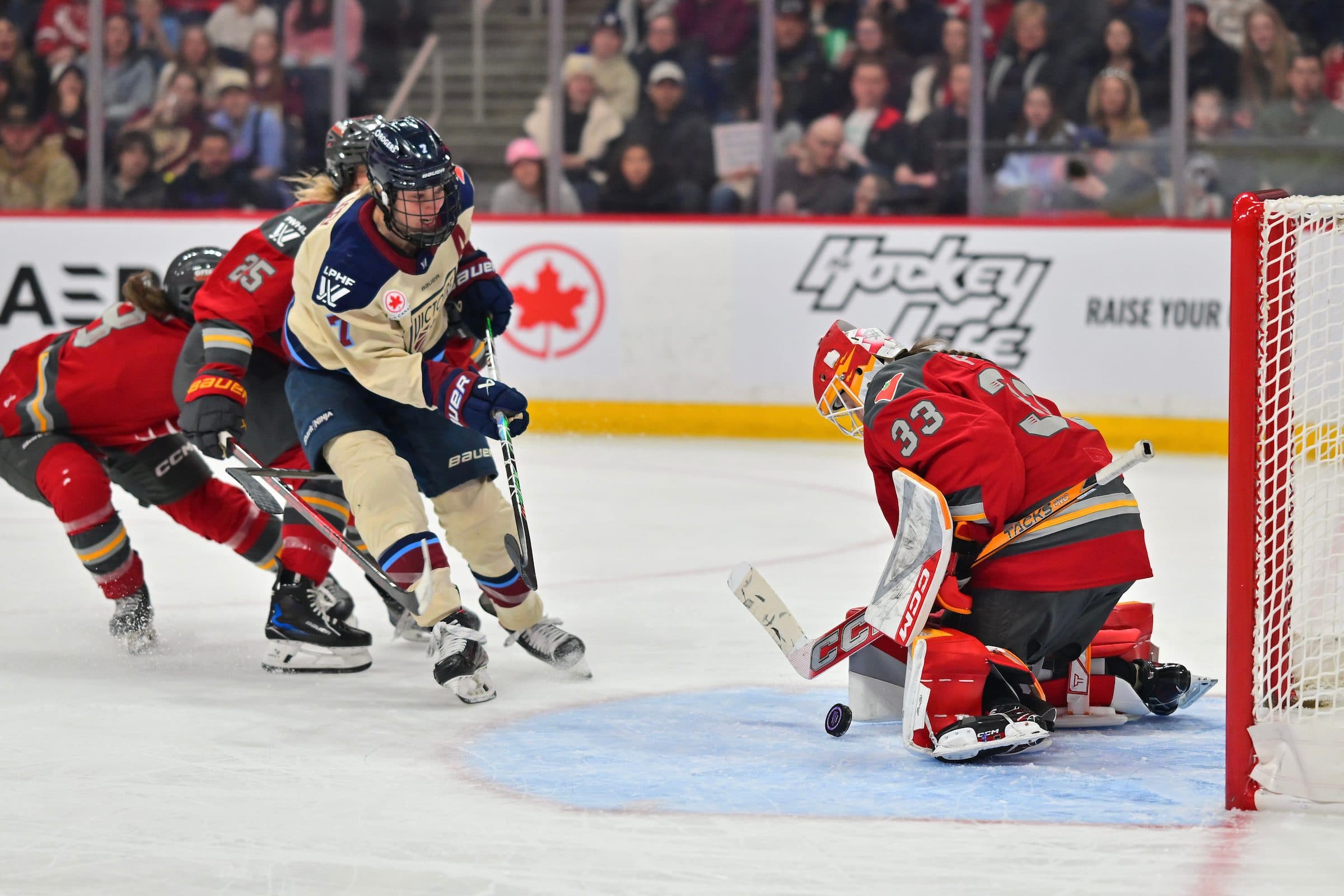 Montreal Victoire forward Laura Stacey, Ottawa Charge goaltender Gwyneth Philips