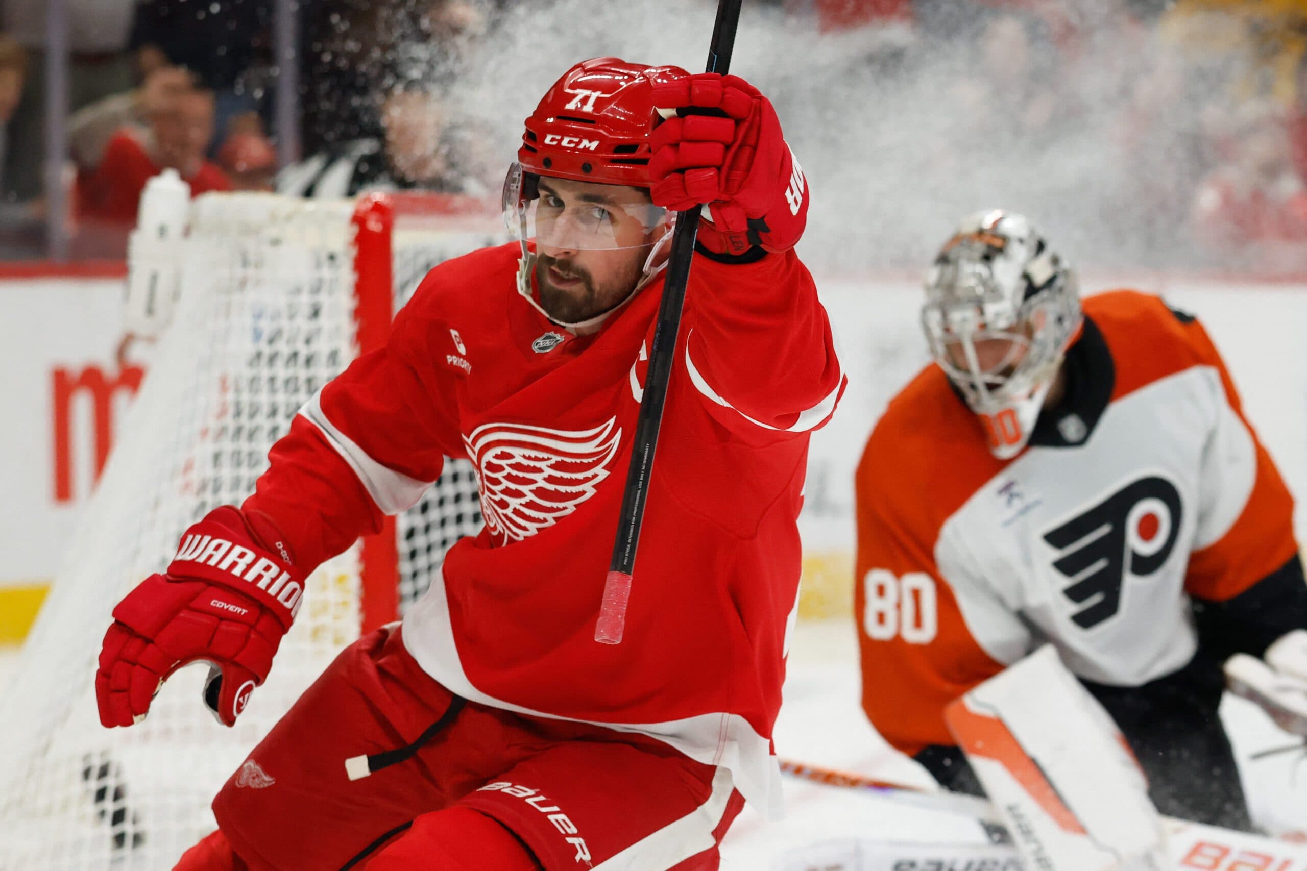 Detroit Red Wings center Dylan Larkin (71) celebrates after scoring on Philadelphia Flyers goaltender Dan Vladar (80) in the second period at Little Caesars Arena.